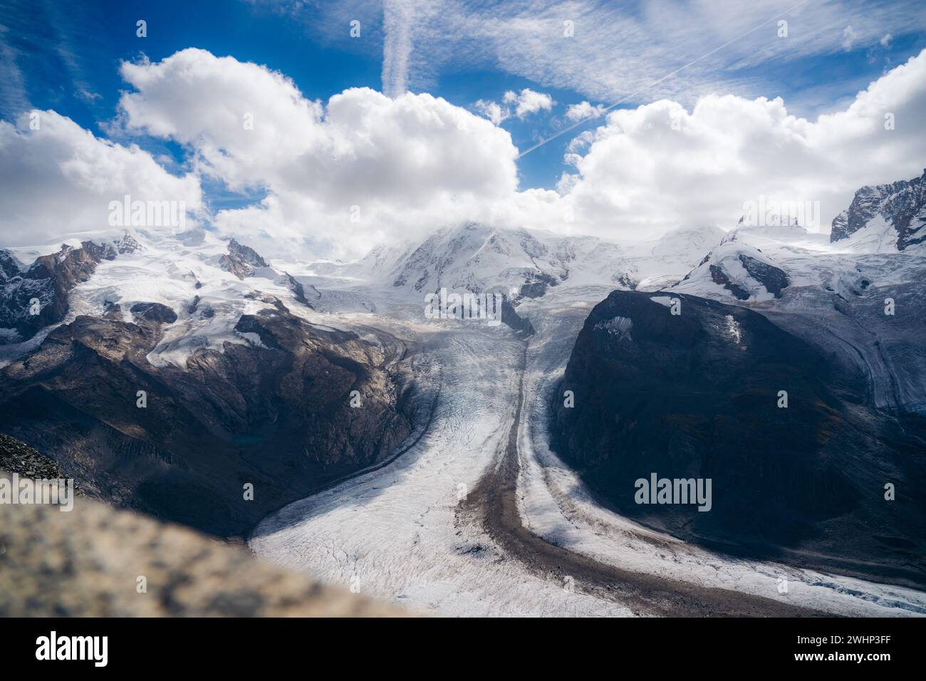 The Snow covered mountain with winding roads in Switzerland Stock Photo