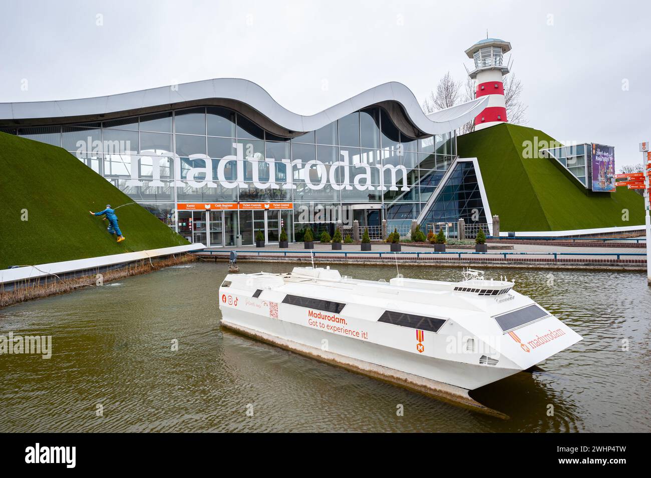Entrance to miniature city Madurodam with small cruise ship in the foreground in city of The Hague, Netherlands. Stock Photo