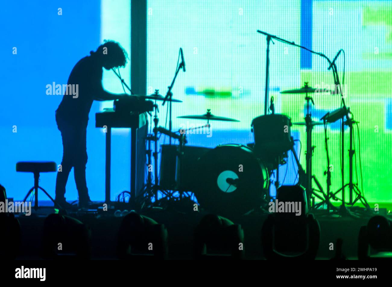 Silhouette of keyboard player on stage during a rock concert Stock Photo
