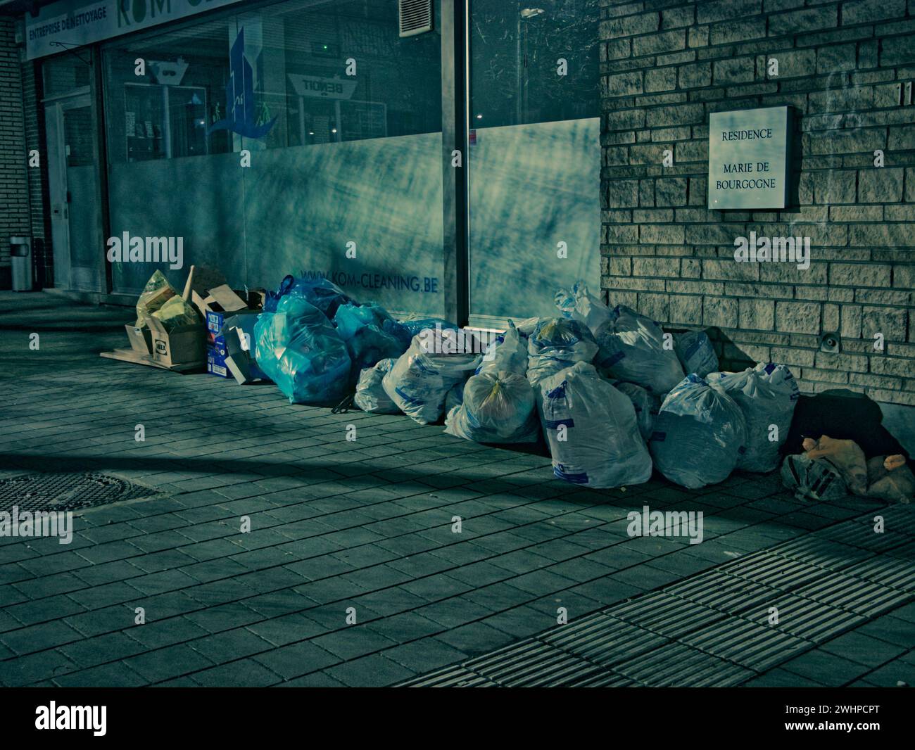 Garbage bags at the curb in Belgium. Brussels trash. Garbage is