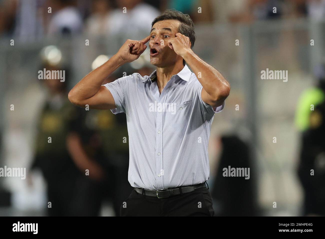 Lima, Peru. 10th Feb, 2024. Universitario de Deportes head coach Fabian Bustos during the Liga 1 Te Apuesto match between Alianza Lima and Universitario de Deportes, Torneo Apertura 2024, date 3, played at Nacional Stadium on February 10, 2024 in Lima, Peru. (Photo by Miguel Marrufo/PRESSINPHOTO) Credit: PRESSINPHOTO SPORTS AGENCY/Alamy Live News Stock Photo