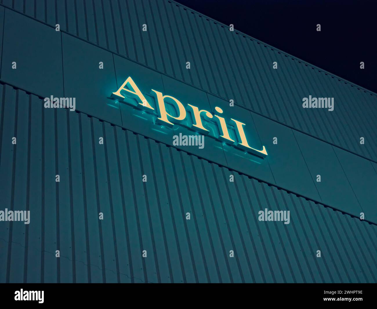 Brussels, Belgium. 6 February 2024. Basilix shopping center. April logo glowing in the night