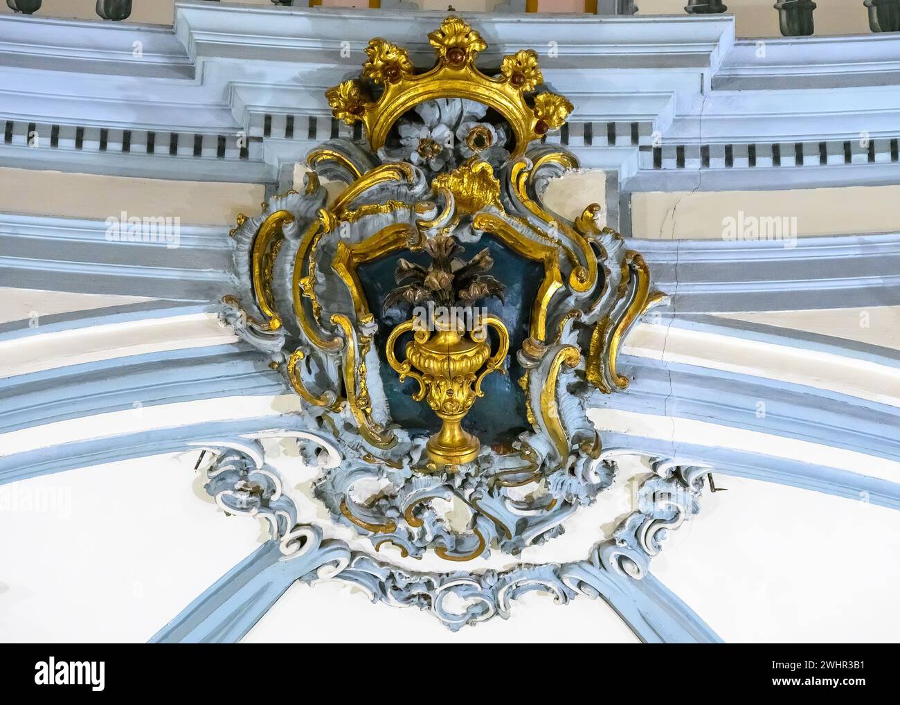 Decoration symbol with royal crown in the border of the dome or cupola. Interior architectural feature of the Museum Church Saint John of God Stock Photo