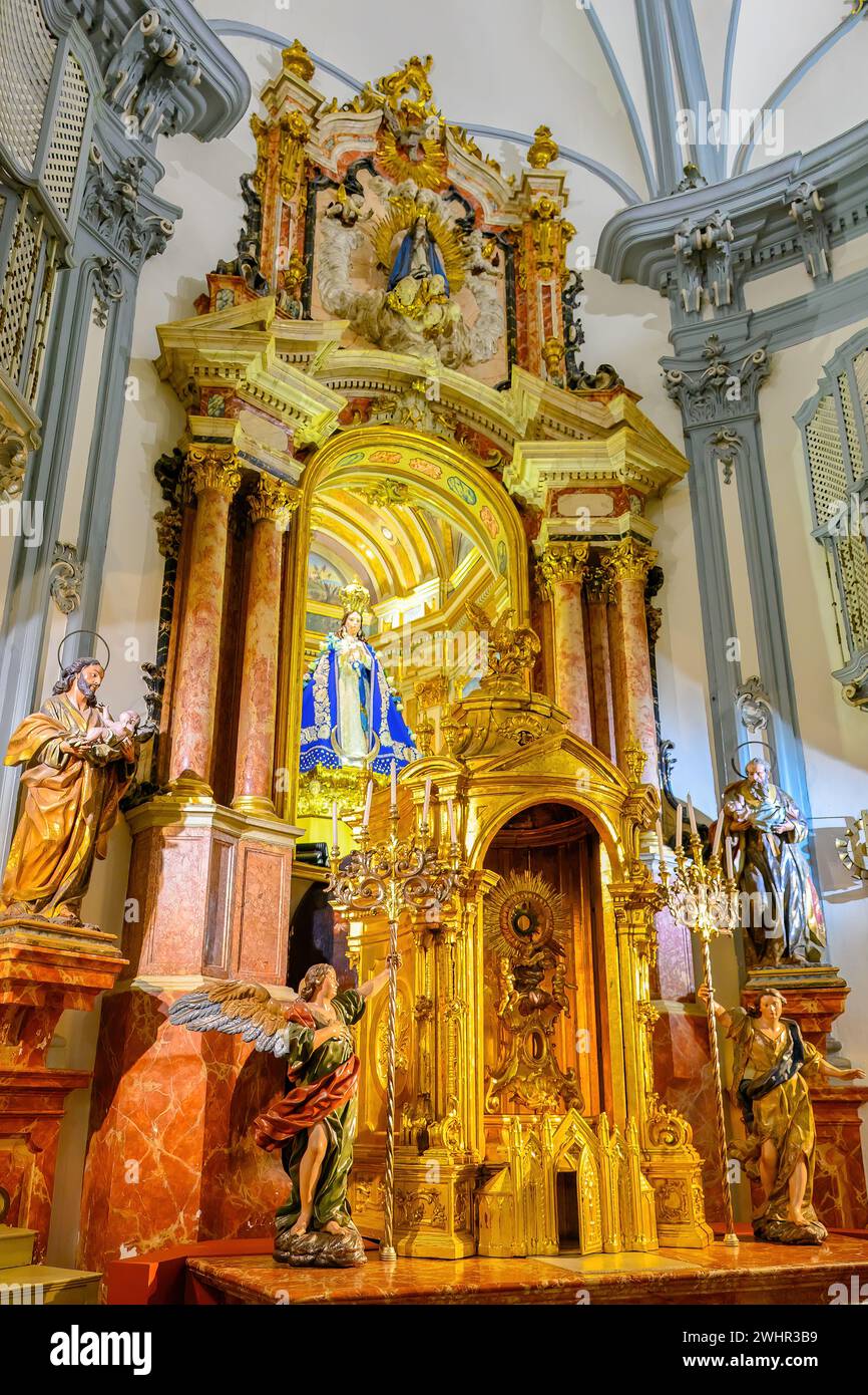 Complete view of altar honoring Virgin Mary of the Catholic Christian culture. Interior architectural feature of the Museum Church Saint John of God Stock Photo