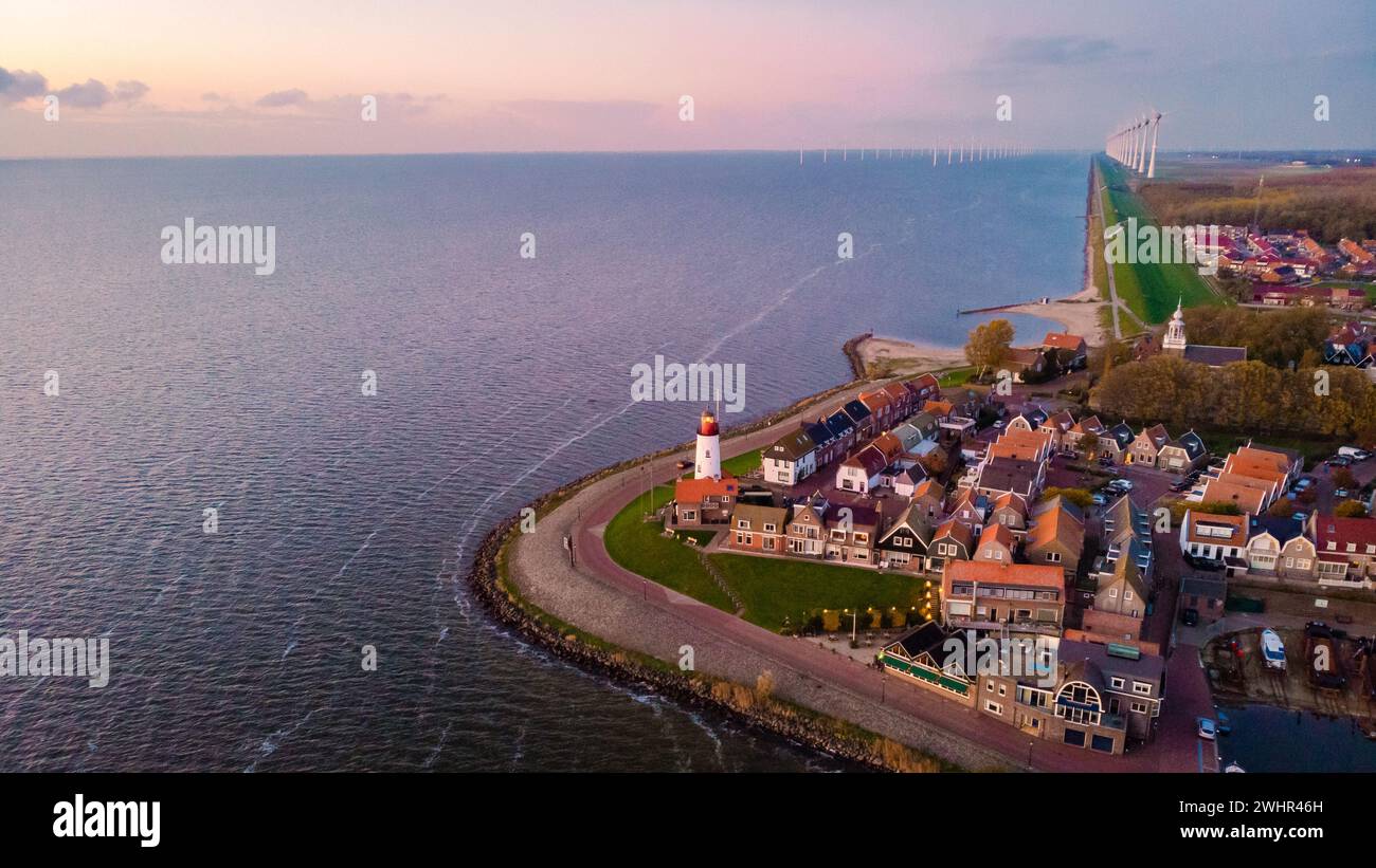 Lighthhouse of Urk Netherlands during sunset in the Netherlands Stock Photo