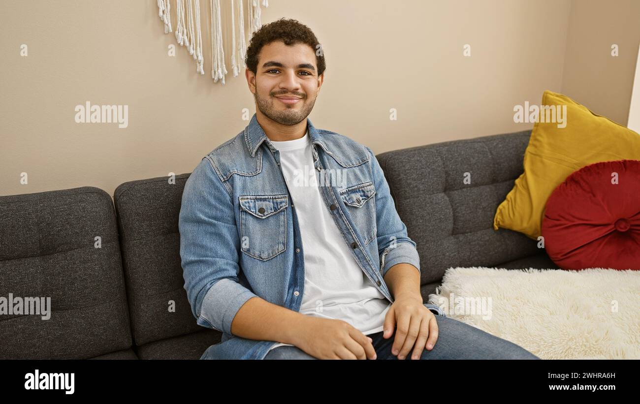 Seated comfortably on sofa happy hi-res stock photography and images ...