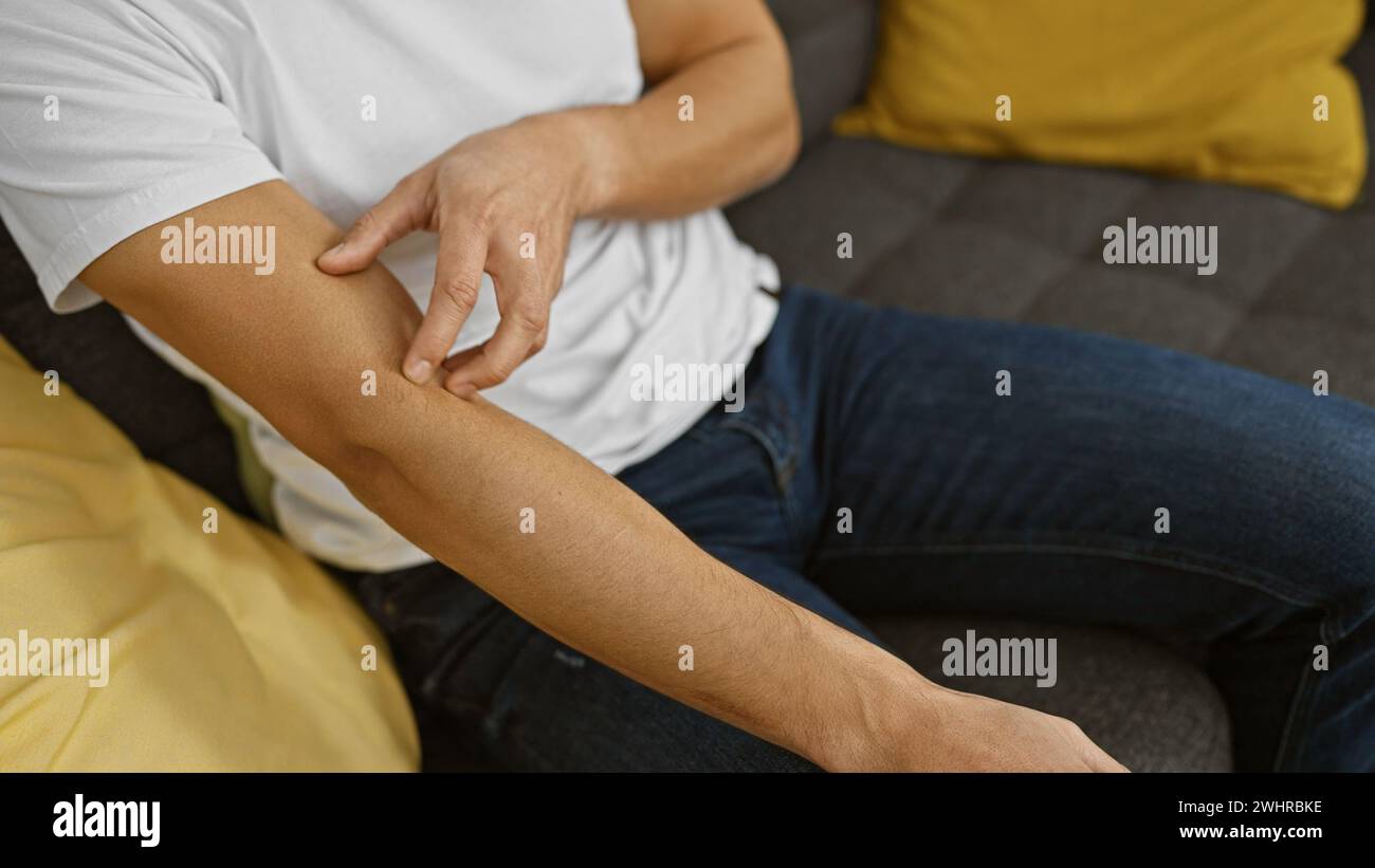 Seated comfortably home young hi-res stock photography and images - Alamy