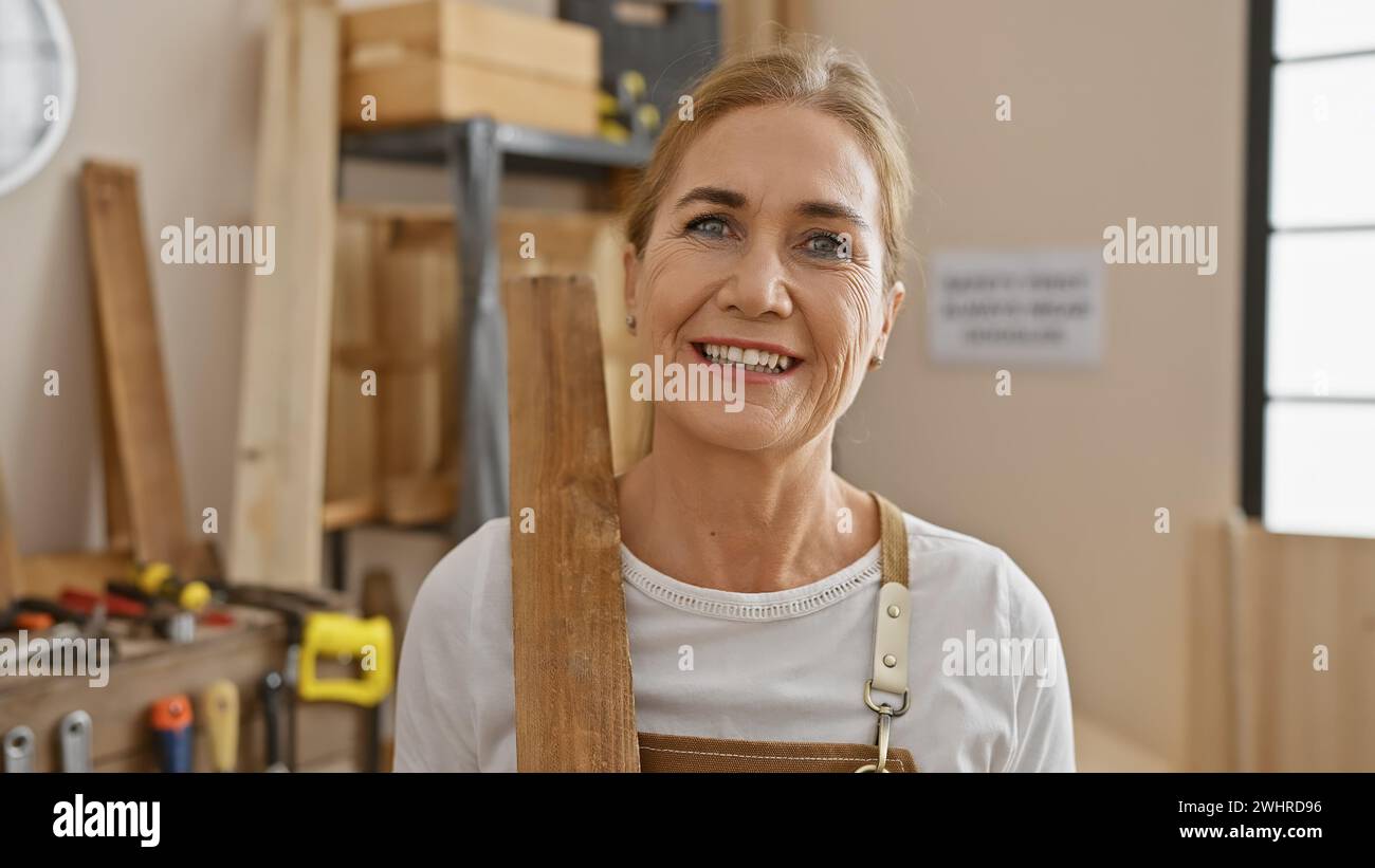 A Smiling Middle aged Blonde Woman In A Carpentry Workshop Surrounded a-smiling-middle-aged-blonde-woman-in-a-carpentry-workshop-surrounded
