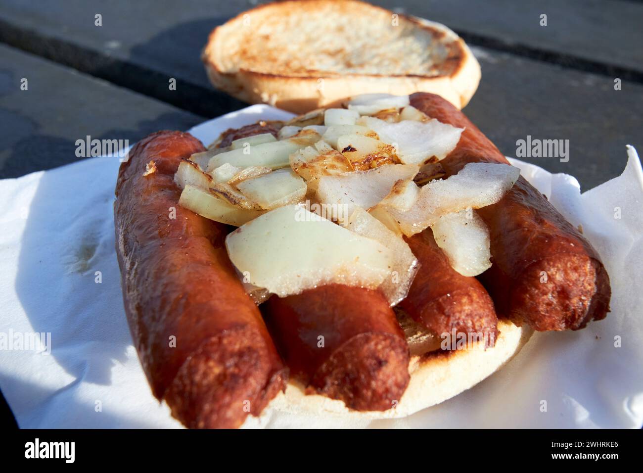 cheap sausage bap with fried onions county antrim northern ireland uk Stock Photo