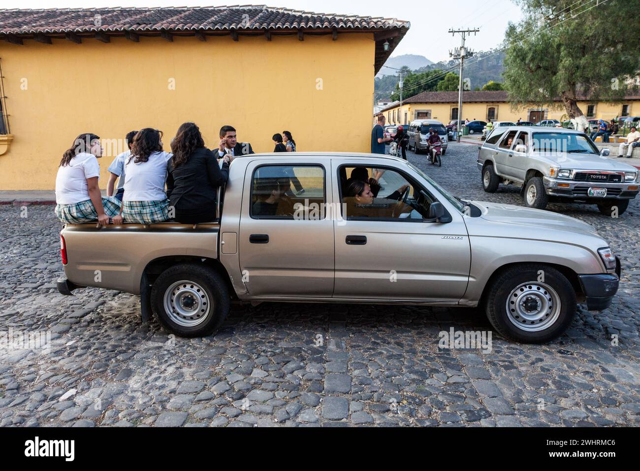 Antigua, Guatemala. Traffic safety. Passengers Riding in Back of Pick ...