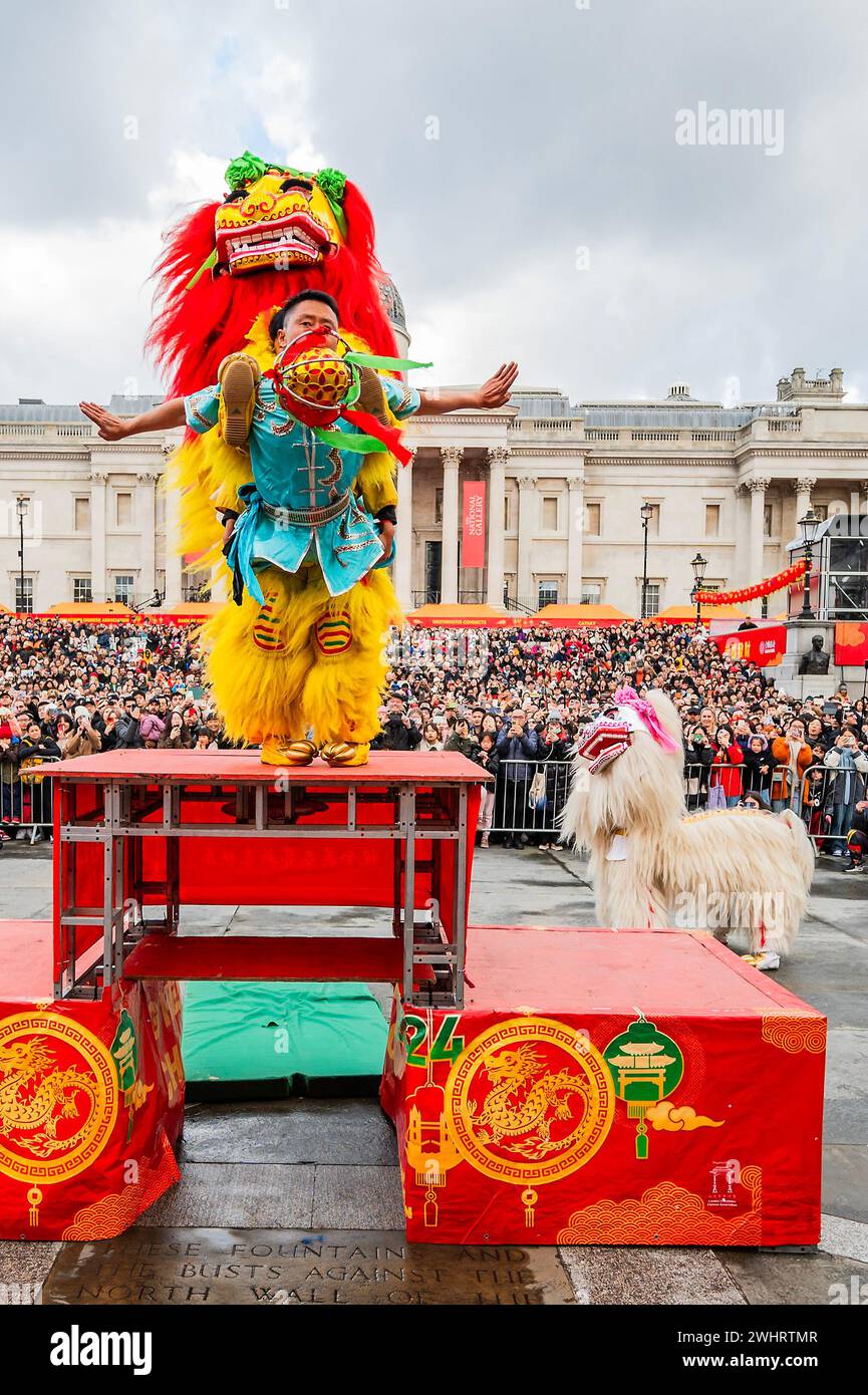 London, UK. 11 Feb 2024. Lion dancers perform their traditional