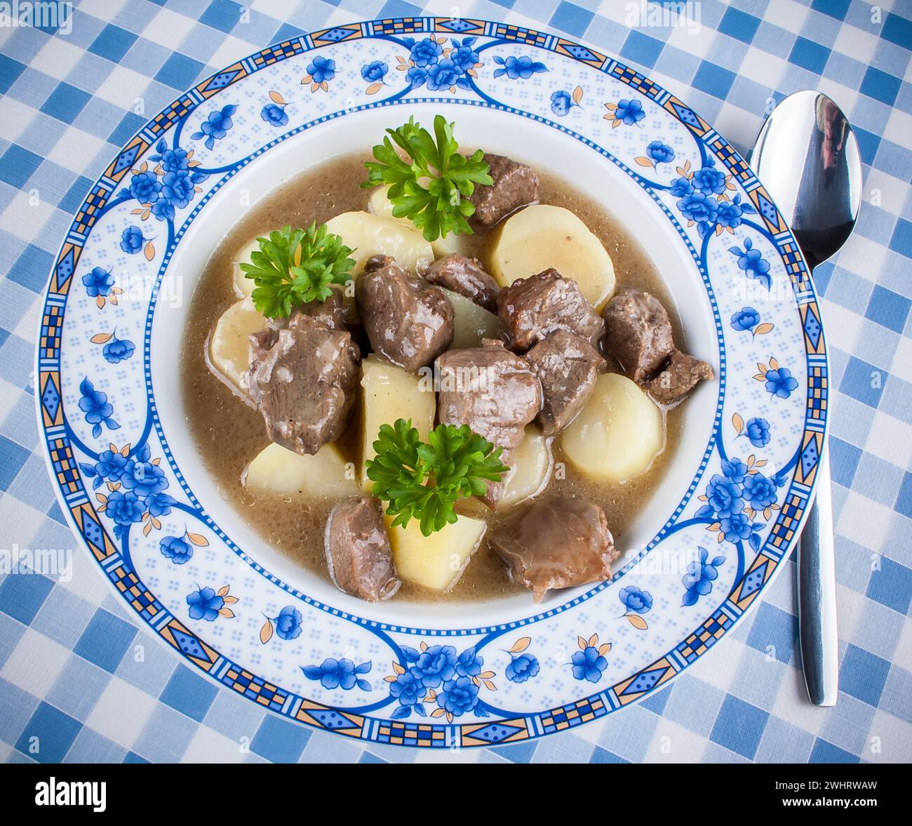 Homemade venison ragout with potato, top view Stock Photo - Alamy