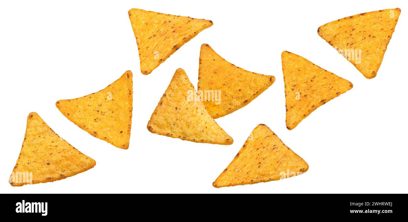 Falling corn chips, hot mexican nachos isolated on white background Stock Photo