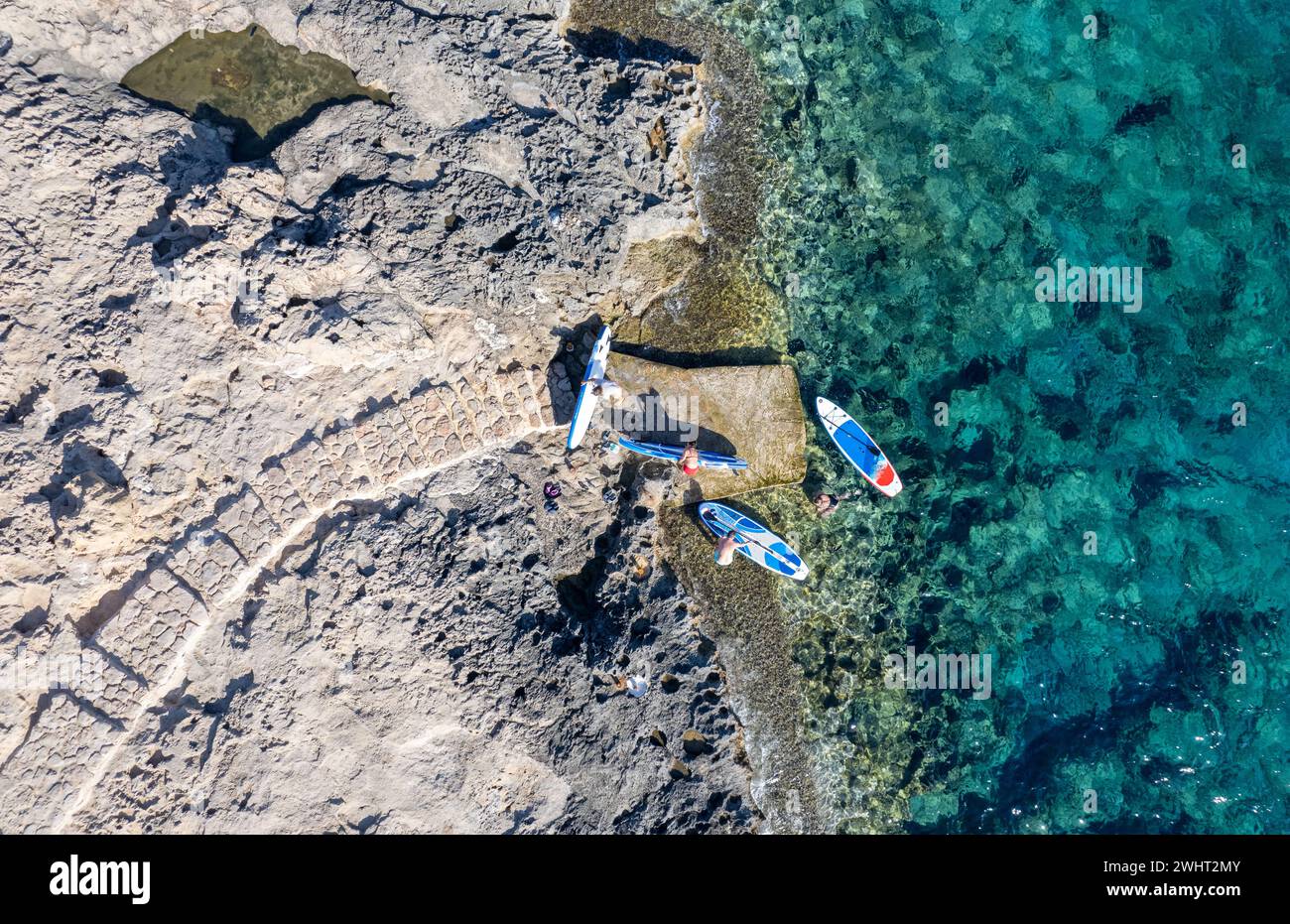 Done view of unrecognized people kayaking in the sea. People active, healthy lifestyle Stock Photo