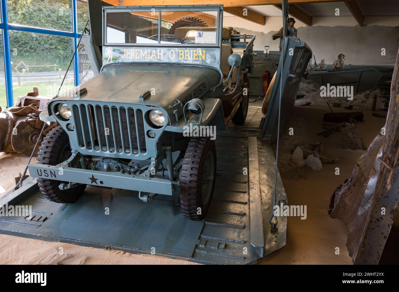 Detail of a Willys Jeep 'Jeremiah O'Brien Portland' leaving an American landing craft to defend the beaches of Normandy Stock Photo