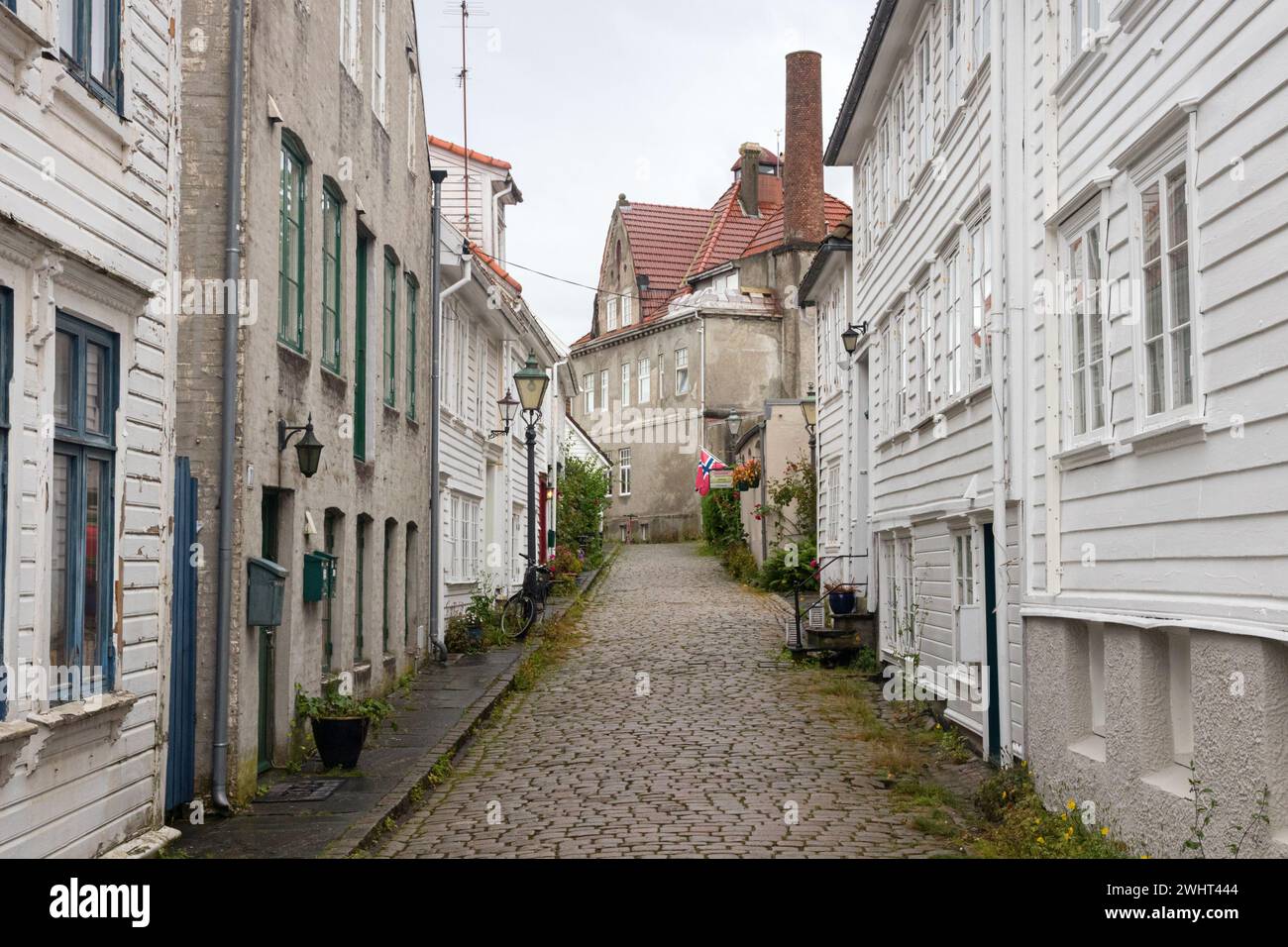 Street with traditional, white, wooden houses in Gamle Stavanger, the old town. Rogaland, Jaeren, Norway. Stock Photo