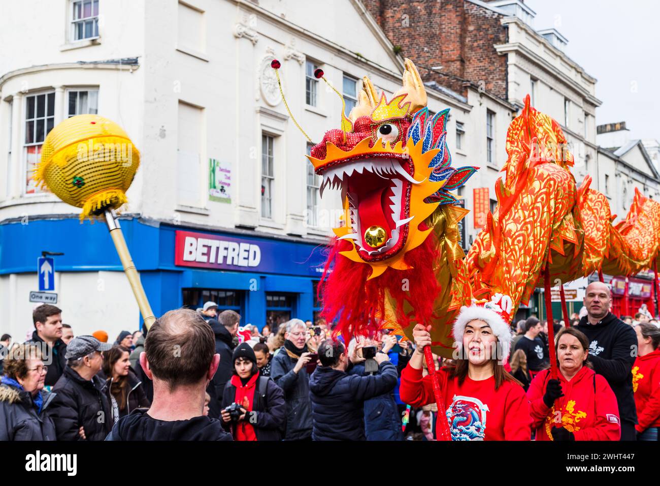 Close up of the beautifully decorated dragon performing its traditional Chinese New Year dragon dance in Liverpool seen on 11 February 2024. Stock Photo