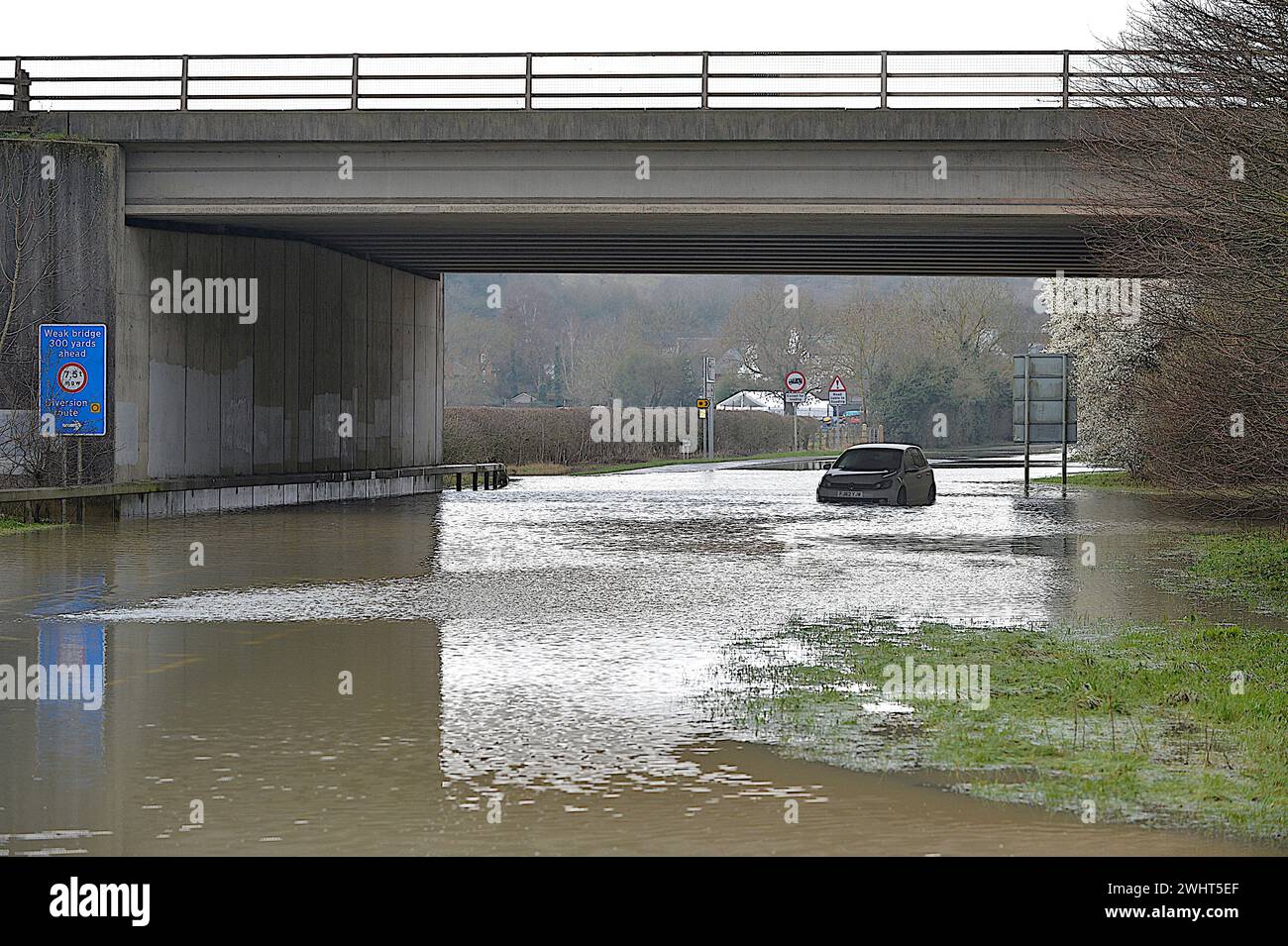 Mountsorrel, Leicestershire, UK, 11th February 2024.  Leicestershire still struggles to recover from the rains with widespread flooding from the River Soar. A vehicle abandoned in the floodwater on Sileby Lane, Mountsorrel. Credit: Chris De Bretton-Gordon / Alamy Live News. Stock Photo