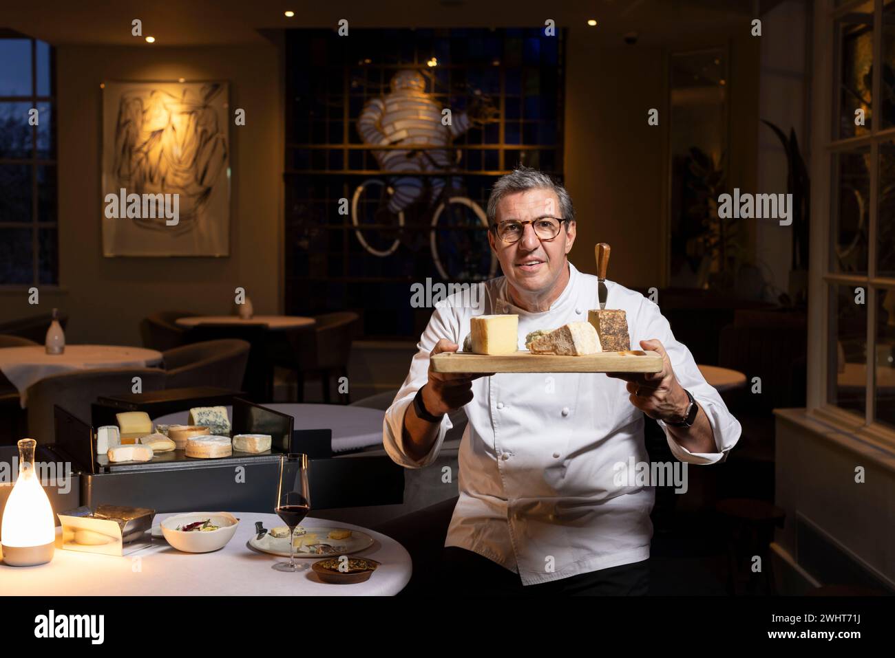 Portraits of Claude Bosi with the cheese trolly and cheeseboard at Bibendum Restuarant, Michelin House, South Kensington, London, UK Stock Photo