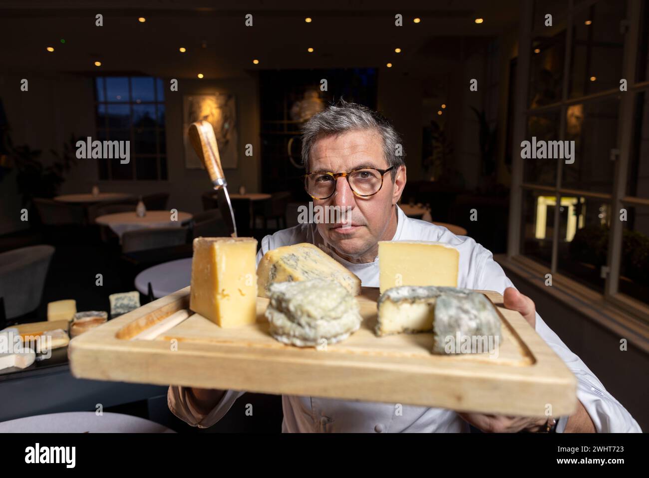 Portraits of Claude Bosi with the cheese trolly and cheeseboard at Bibendum Restuarant, Michelin House, South Kensington, London, UK Stock Photo