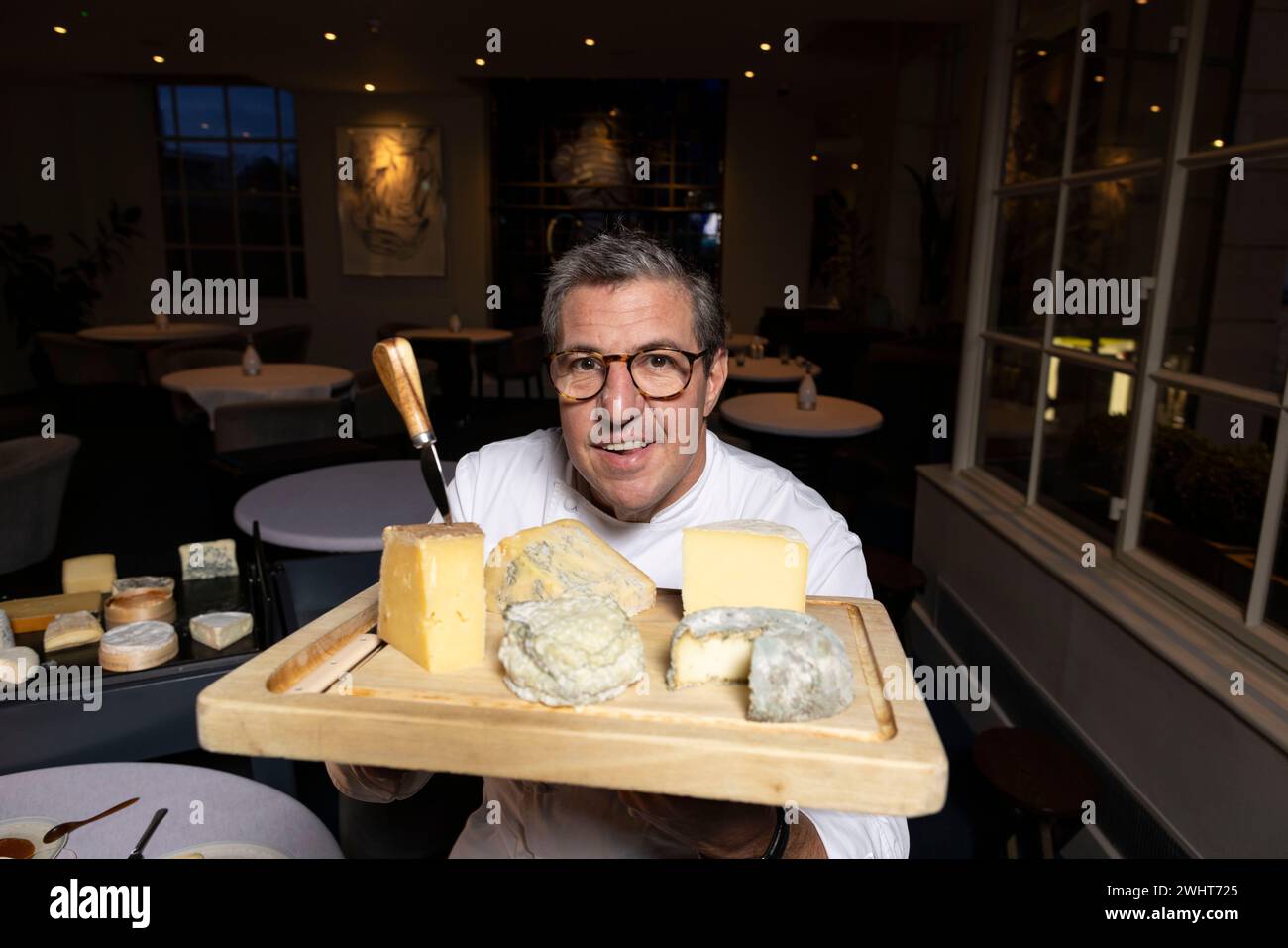Portraits of Claude Bosi with the cheese trolly and cheeseboard at Bibendum Restuarant, Michelin House, South Kensington, London, UK Stock Photo