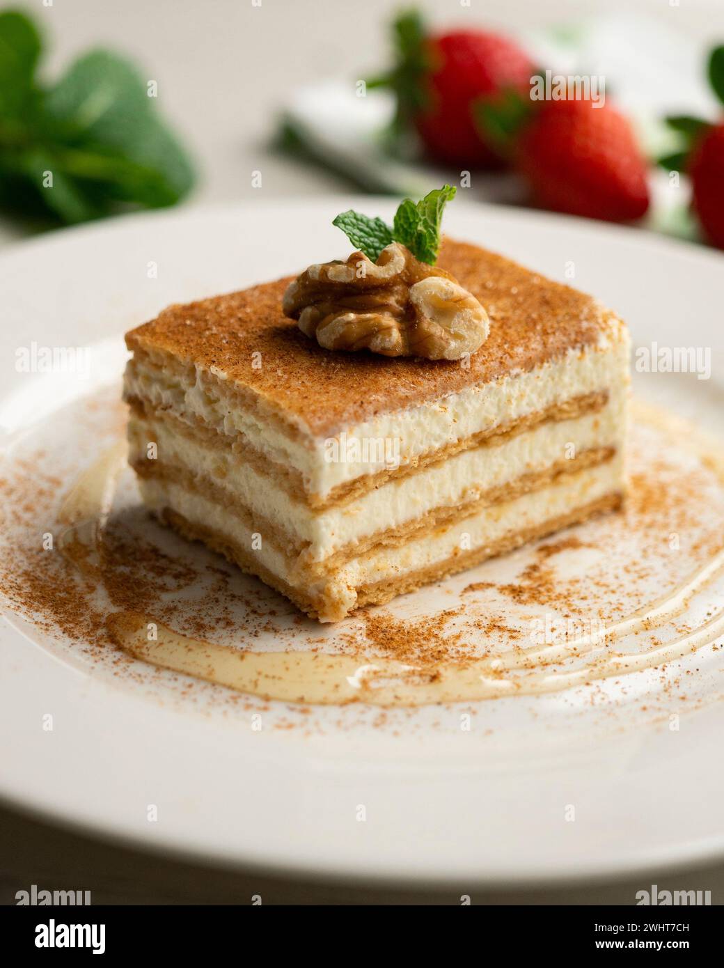 Cream cake with layers of cookies and cream. Stock Photo