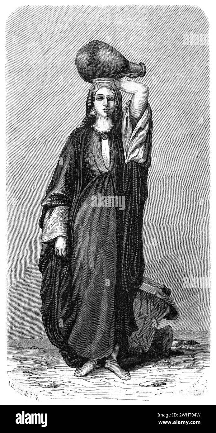 Full-length Portrait of Egyptian Fellah Woman, Water Carrier, Farmer or Agriultural Labourer, Wearing Traditional Clothes or Ethnic Wear and Carrying Water Jar or Jug Egypt Africa. Vintage or Historic Engraving or Illustration 1863 Stock Photo