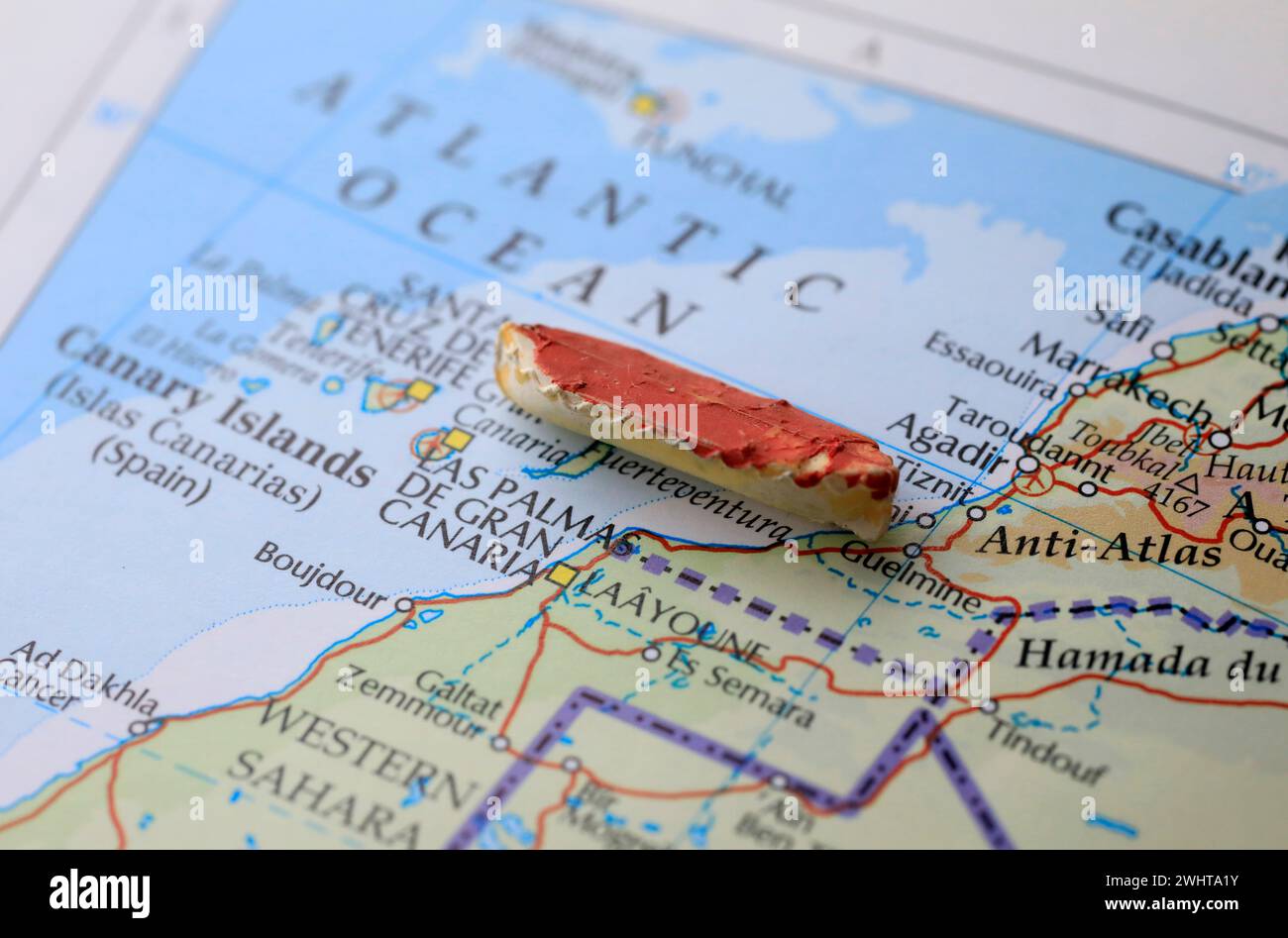 A boat and a map of Africa representing the immigration over sea Stock ...