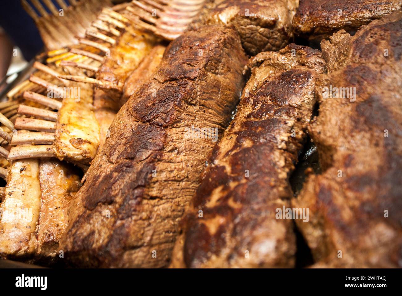 Sizzling BBQ Delight: Steak and Lamb Ribs Grill Masterpiece Stock Photo