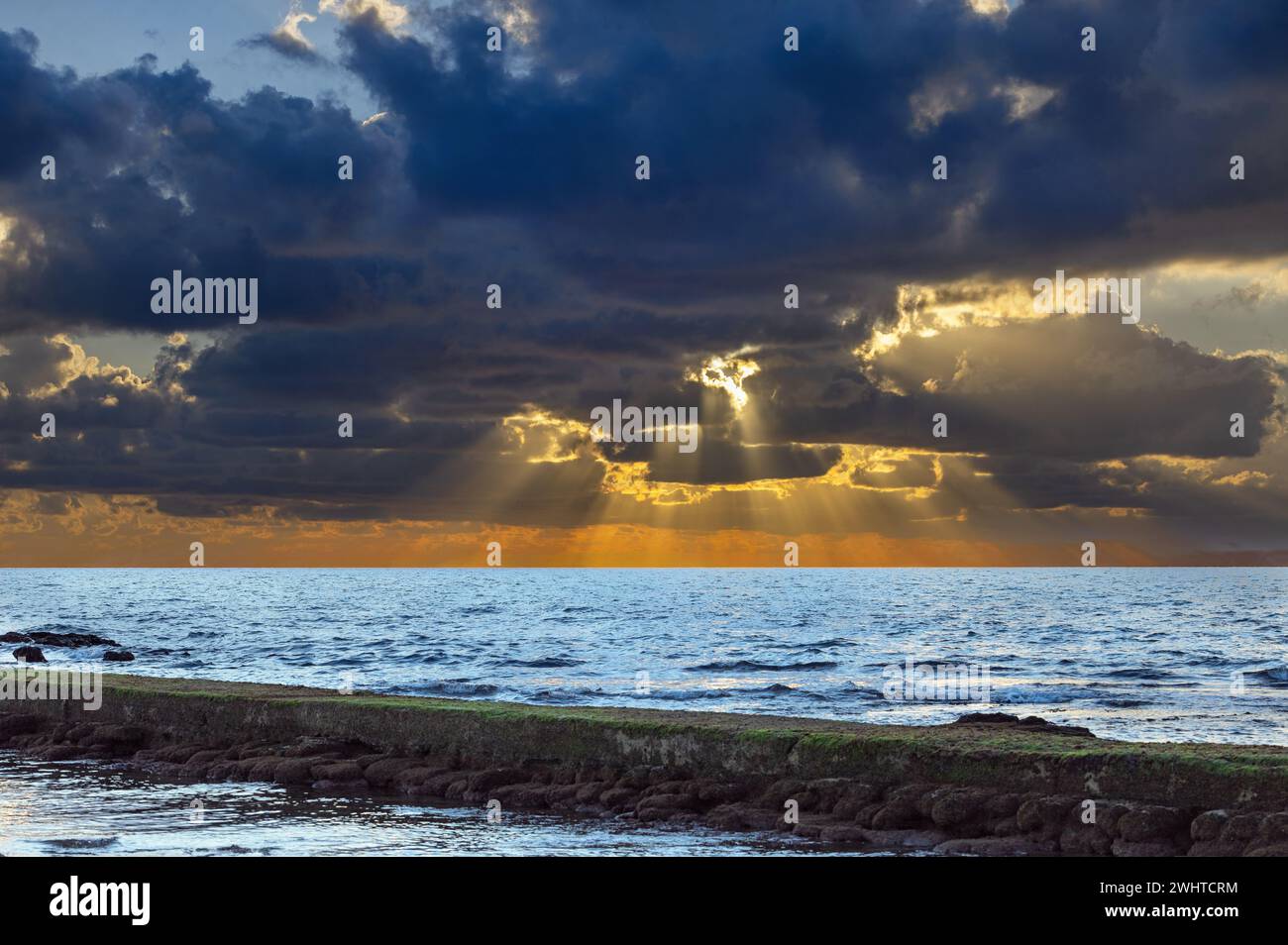 beautiful sea against the sky at sunset in Caesarea Israel Stock Photo