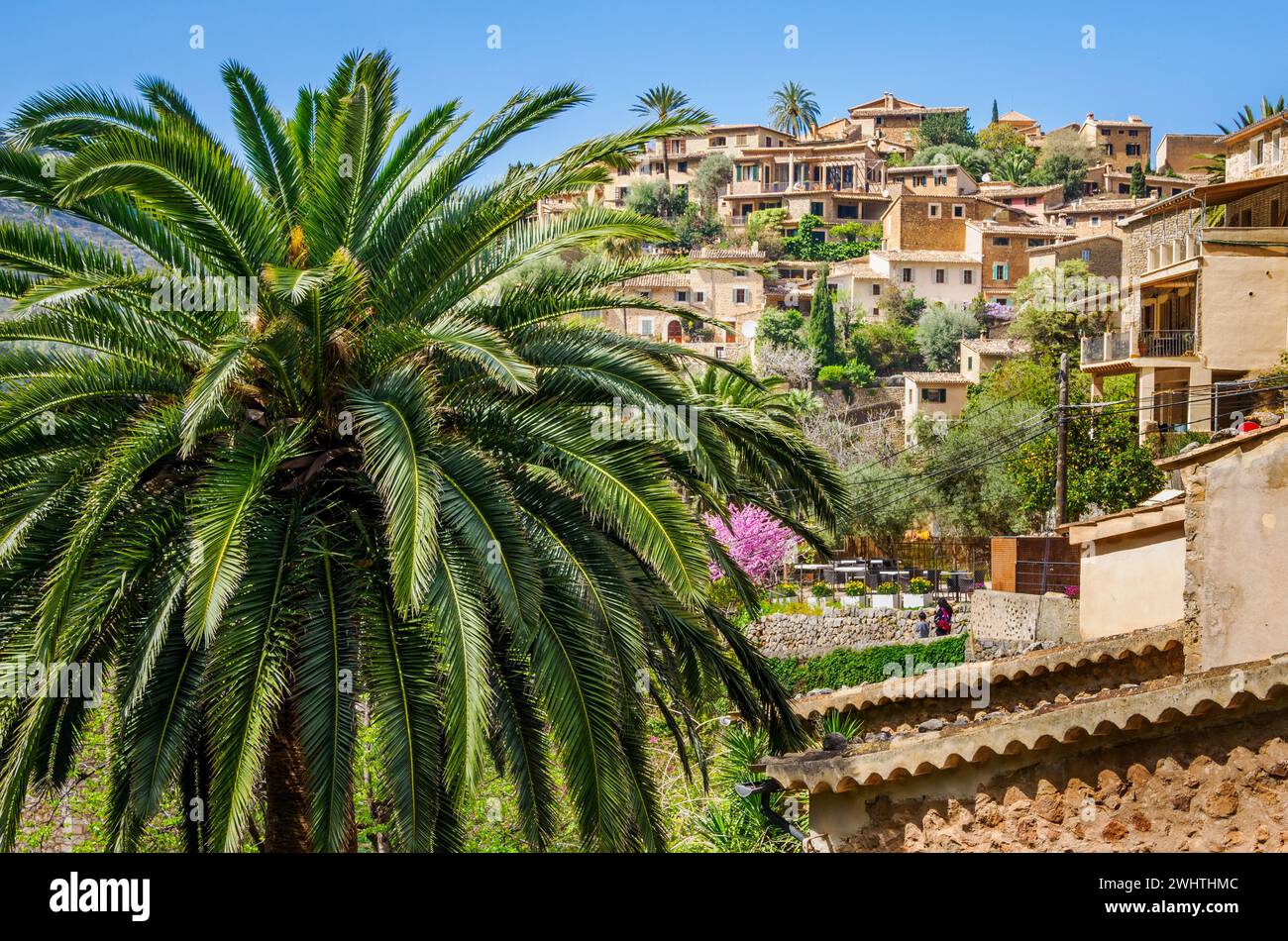 The lovely hilltop village of Deia in the Tramuntana Mountains of Majorca in Spain's Balearic Islands Stock Photo