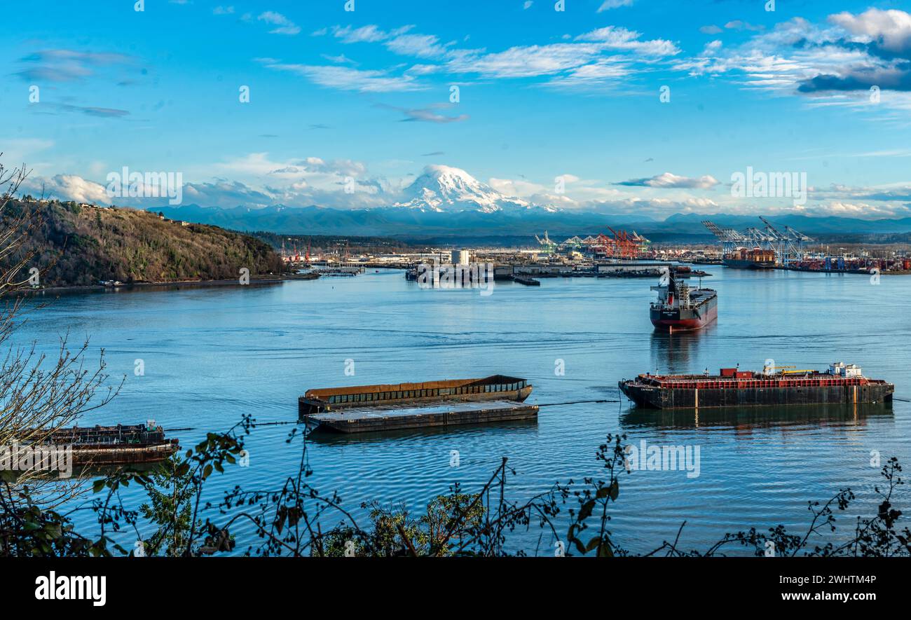 Mount Rainier towers over the Port of Tacoma in Washington State Stock ...