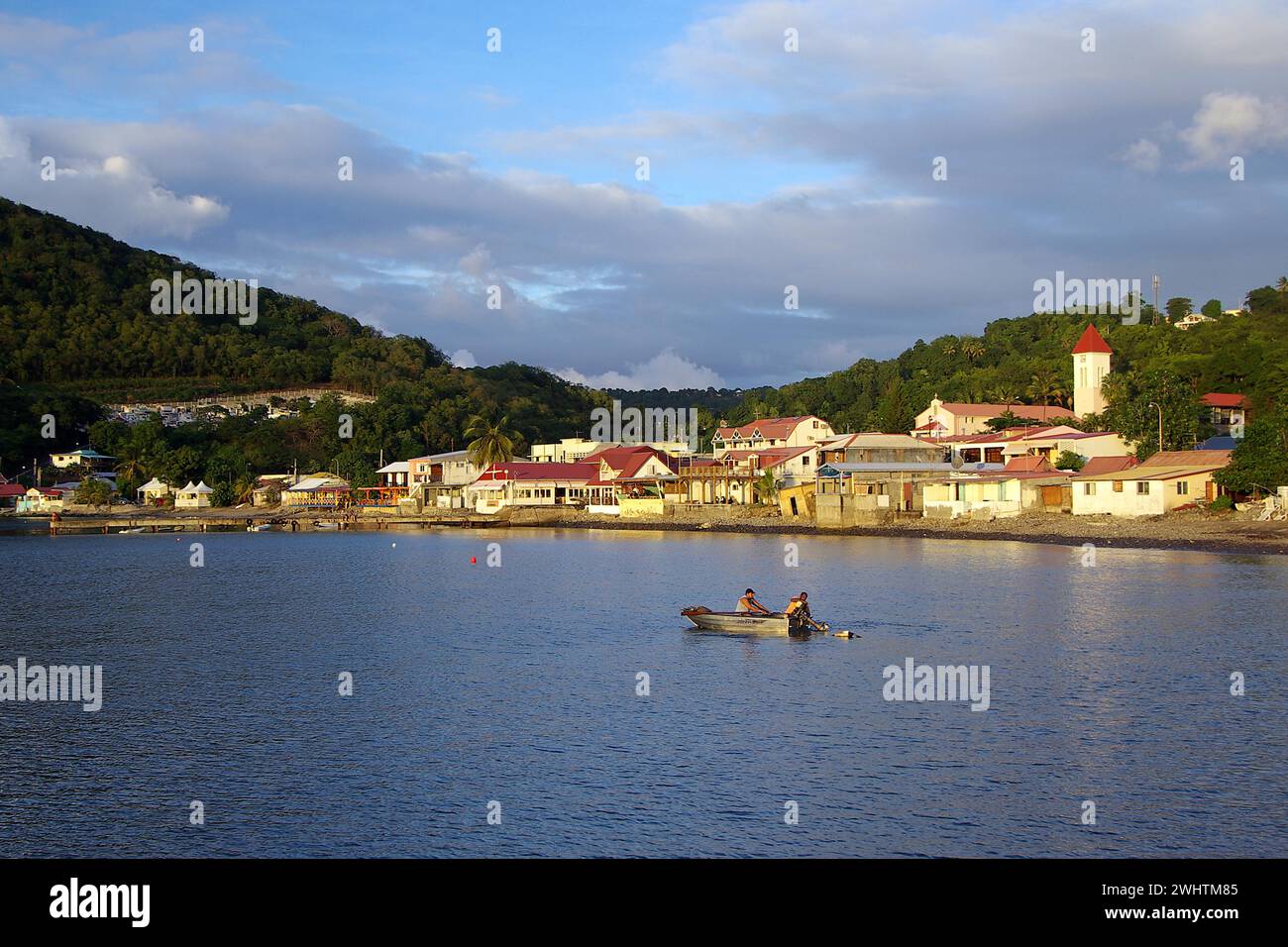 Caribbean, French Antilles, Guadeloupe, Basse-Terre, View of the village of Deshaies with harbour basin Stock Photo