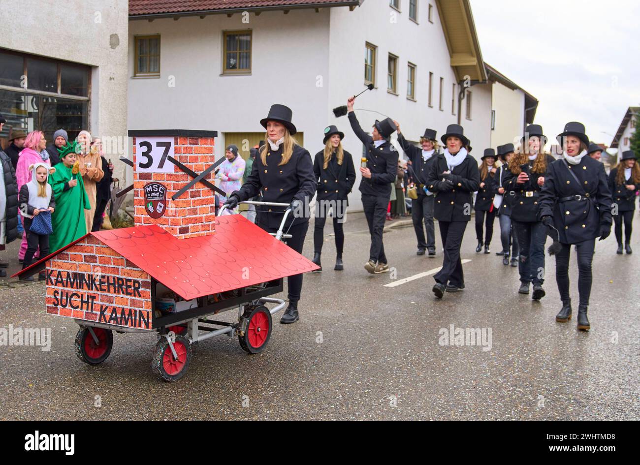 Gaudiwurm carnival parade about chimney sweep on Feb 11, 2024 in