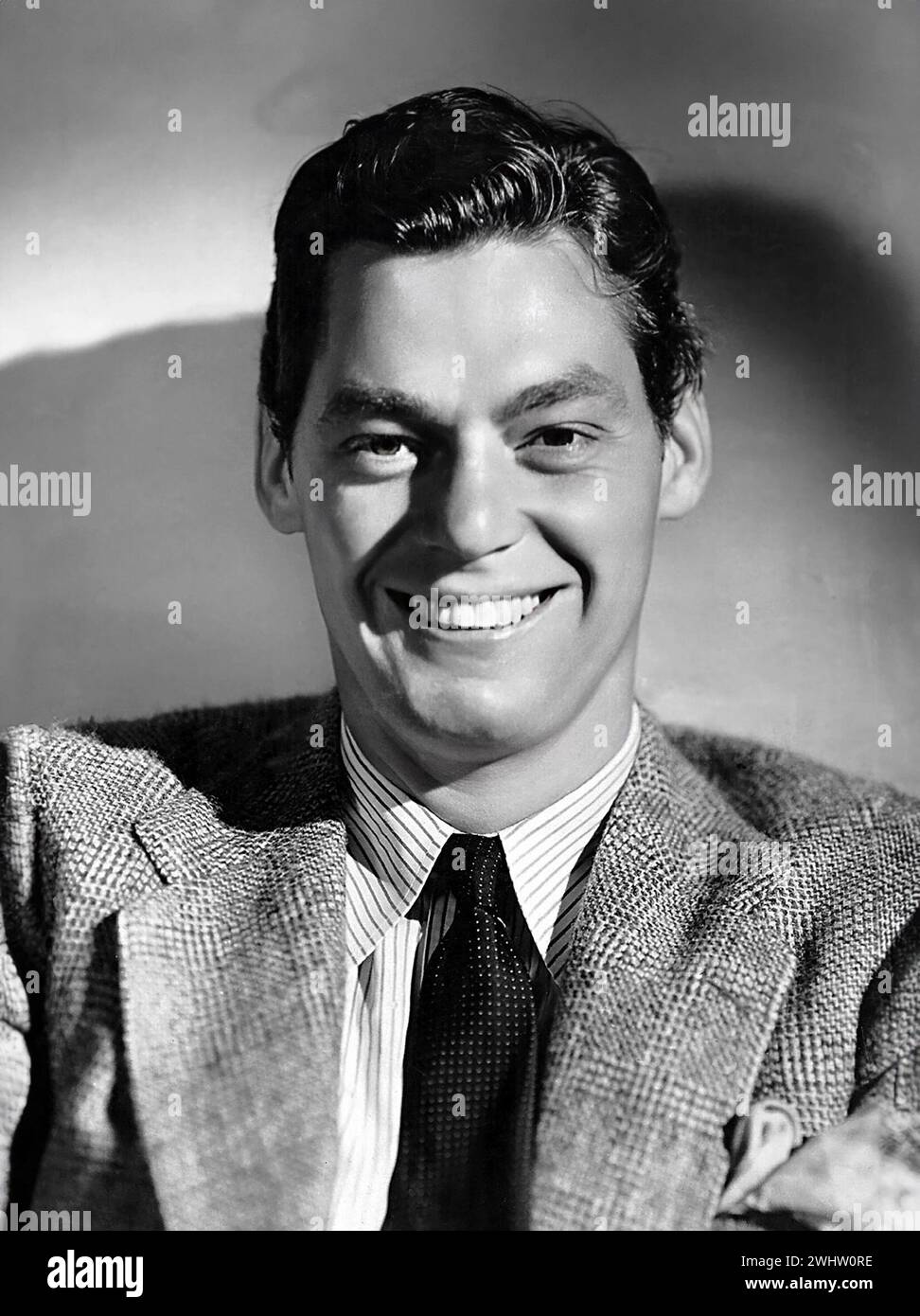 Johnny Weissmuller. Portrait of the American Olympic swimmer and actor, Johnny Weissmuller (born Johann Peter Weißmüller, 1904-1984) in the 1940s Stock Photo