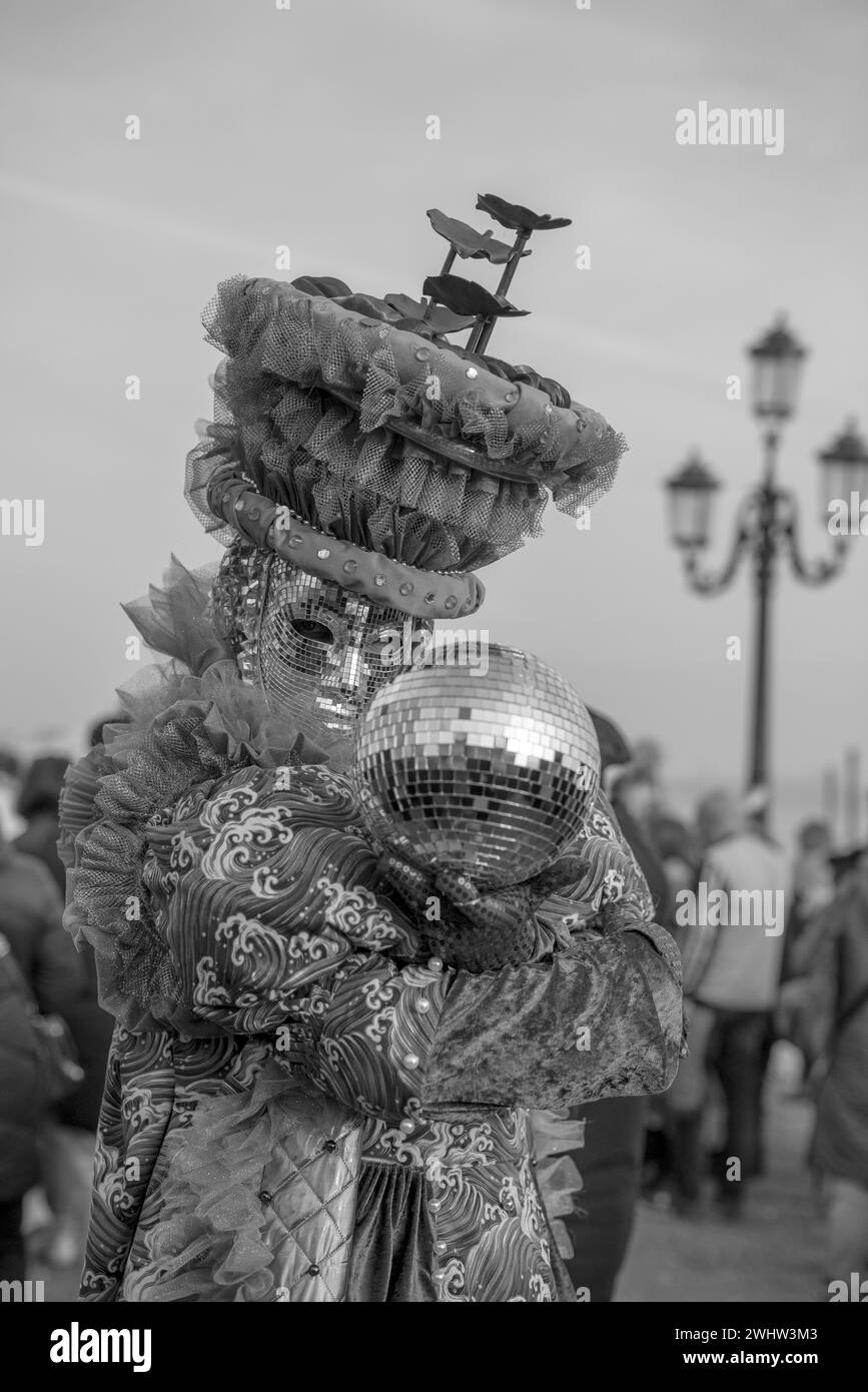 Locals and visitors alike dress up in costumes for Venice's famous and