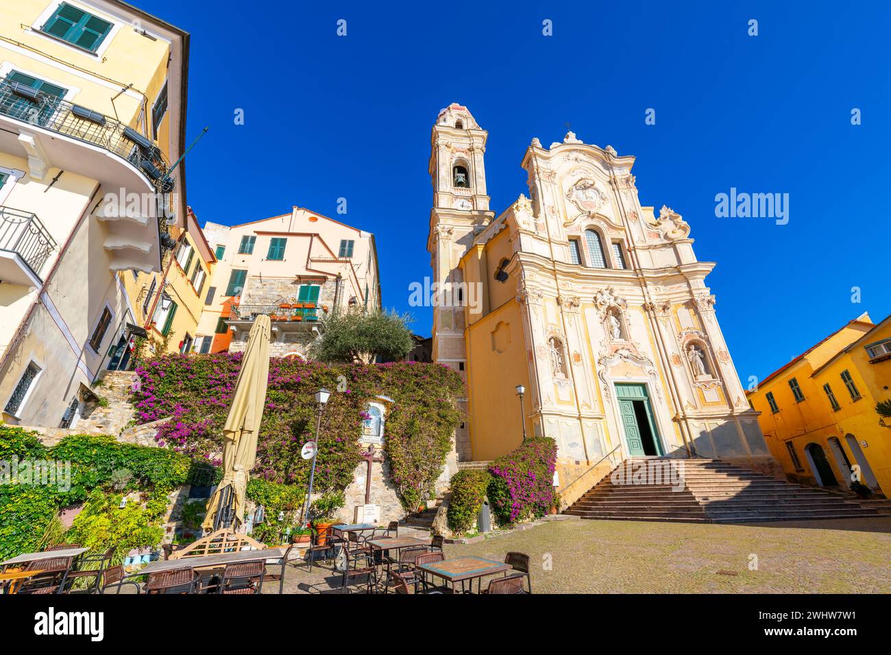 The 17th century Church of San Giovanni Battista rising above the medieval hill town of Cervo, Italy, in the Ligurian region of Northwest Italy. Stock Photo