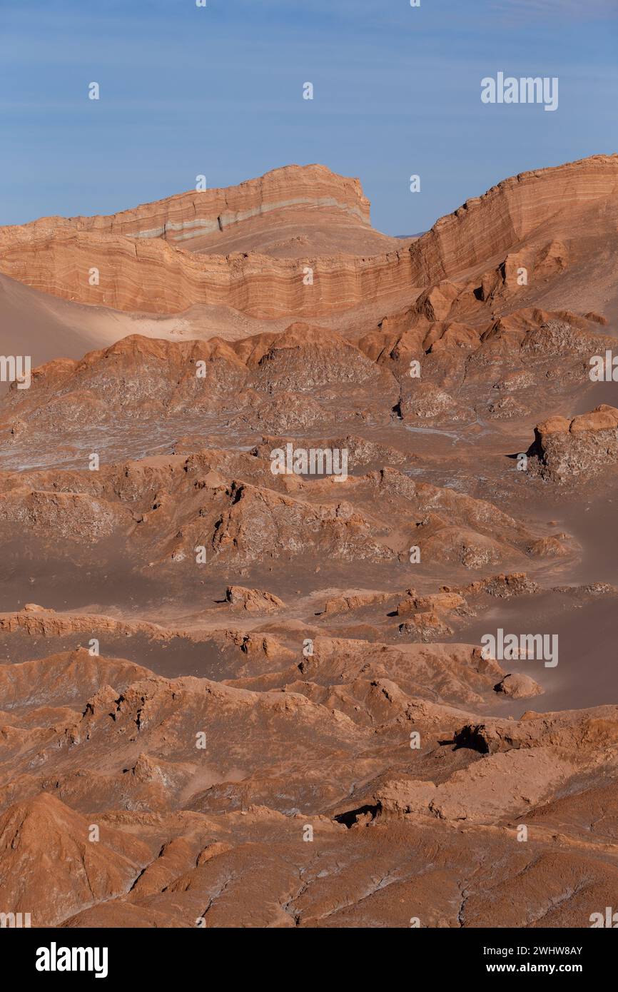Huge, towering rock formations in the middle of the Valley of the Moon, Valle de la Luna, within the Atacama Desert in northern Chile. Stock Photo