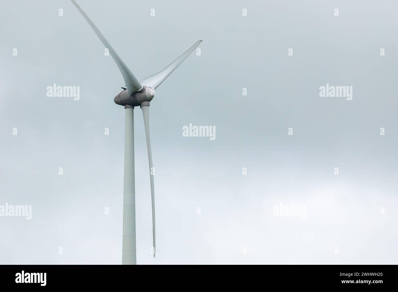 Close up blades of wind Turbine in sky background. Stock Photo