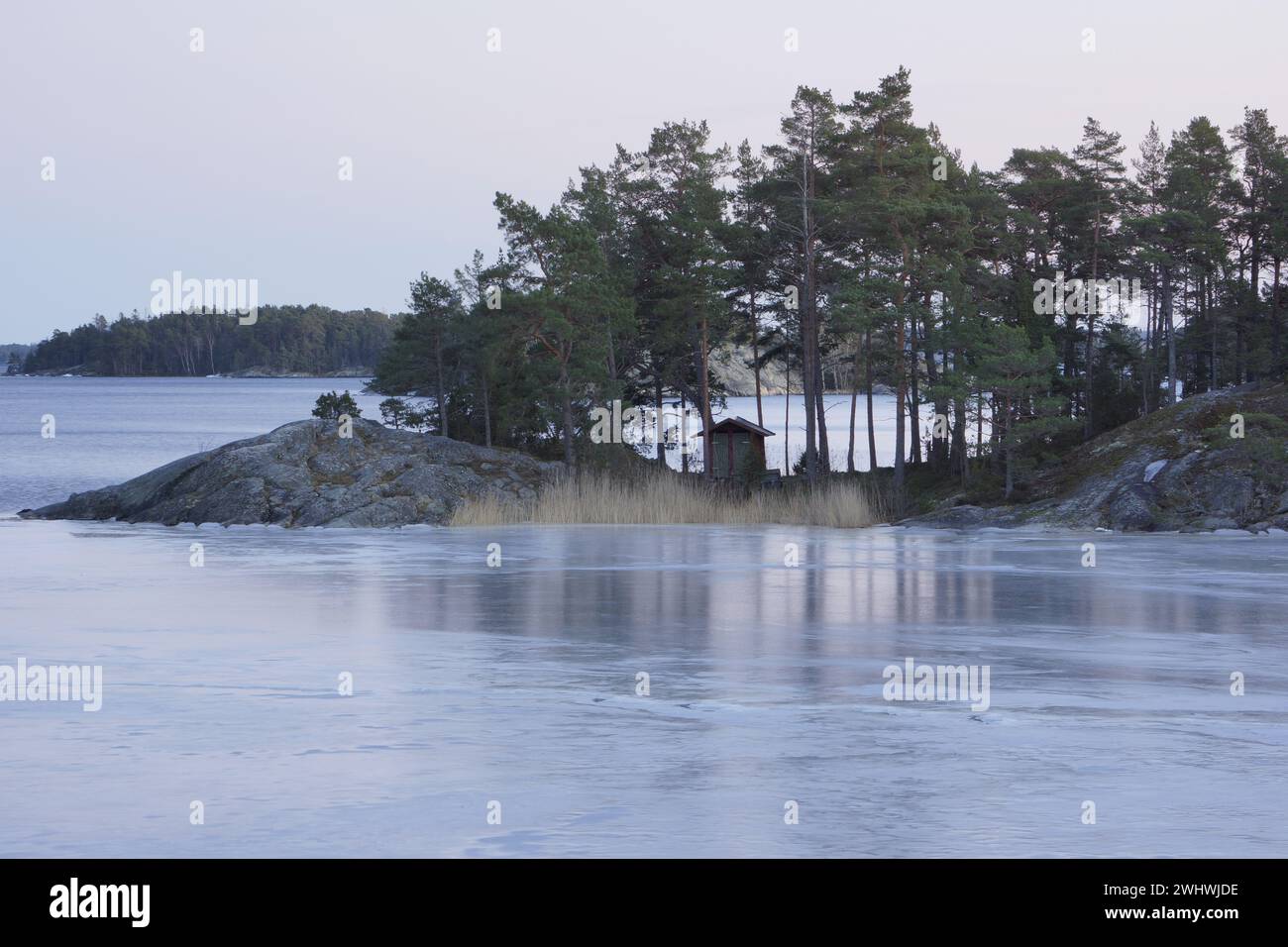 View of Bjorn nature reserve on a nice winter evening in the Stockholm archipelago Stock Photo