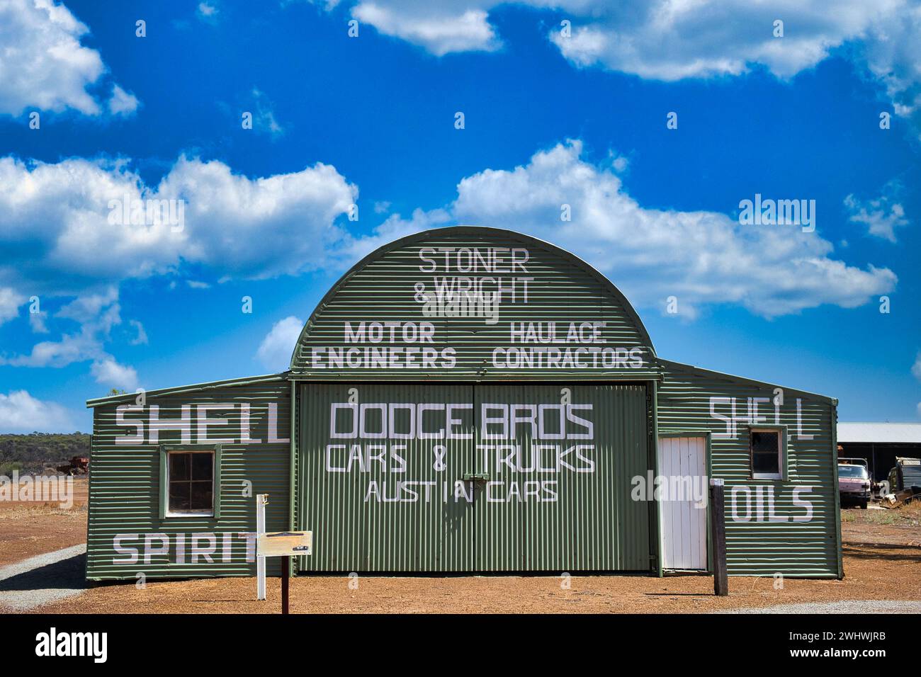 Well-preserved vintage garage made of corrugated iron in a small town in the Australian outback. Pindar, Western Australia Stock Photo
