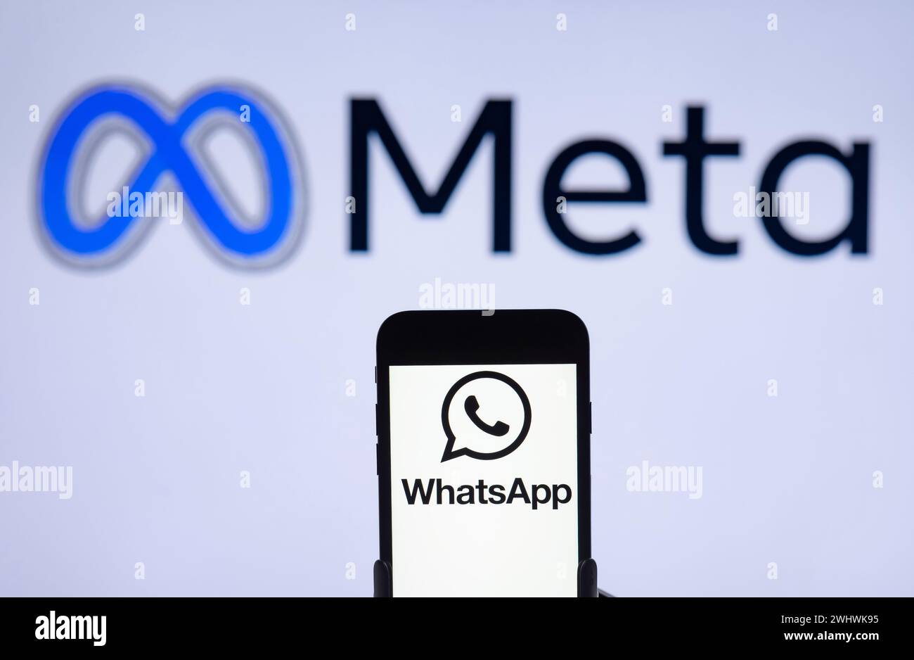 India. 12th Feb, 2024. In this photo illustration, the WhatsApp logo is seen displayed on a mobile phone screen with Meta logo in the background. (Photo by Idrees Abbas/SOPA Images/Sipa USA) *** Strictly for editorial news purposes only *** Credit: Sipa USA/Alamy Live News Stock Photo