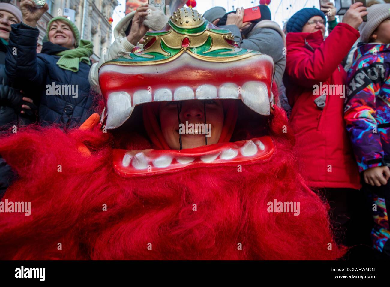 Moscow, Russia. 10th of February, 2024. Artists perform a chinese lion dance during the Chinese Lunar New Year celebration at a street during the Chinese New Year Festival in Kamergersky Lane in Moscow, Russia Stock Photo