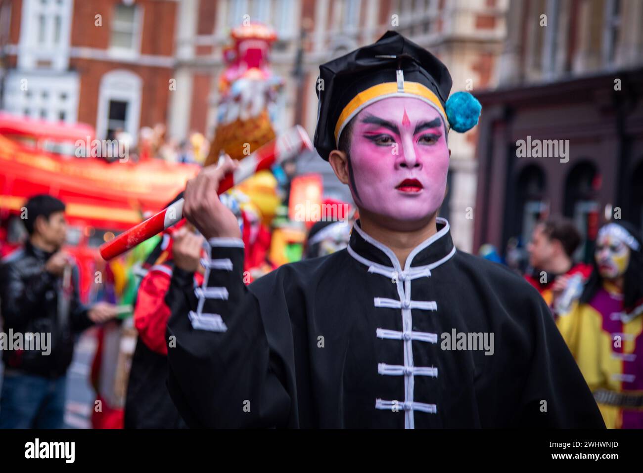 Performers in costumes entertain spectators during the Chinese New Year