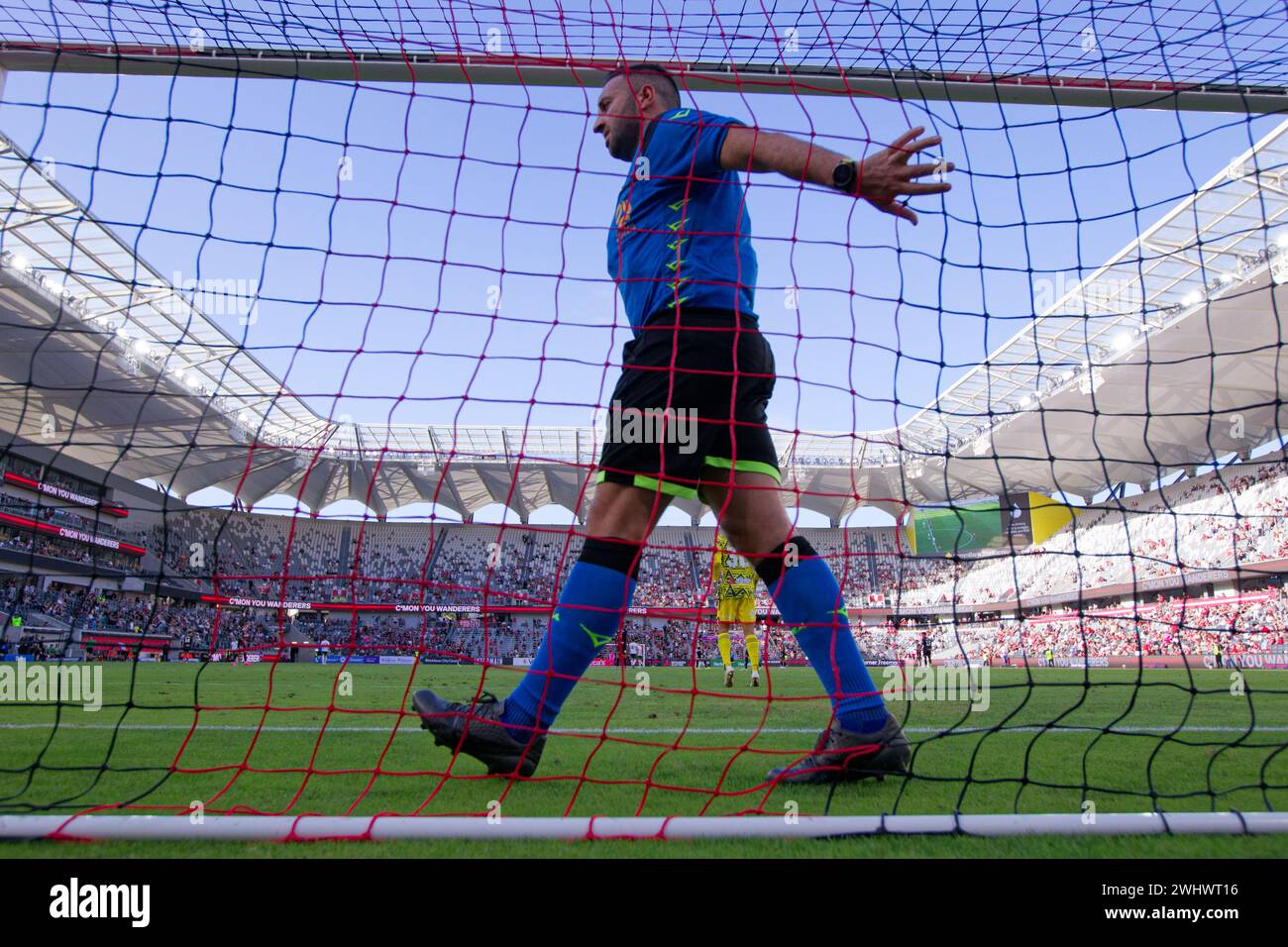 Sydney, Australia. 11th Feb, 2024. Assistant referee, George Lakrindis checks the nets during the A-League Men Rd16 match between the Wanderers and Newcastle Jets at CommBank Stadium on February 11, 2024 in Sydney, Australia Credit: IOIO IMAGES/Alamy Live News Stock Photo