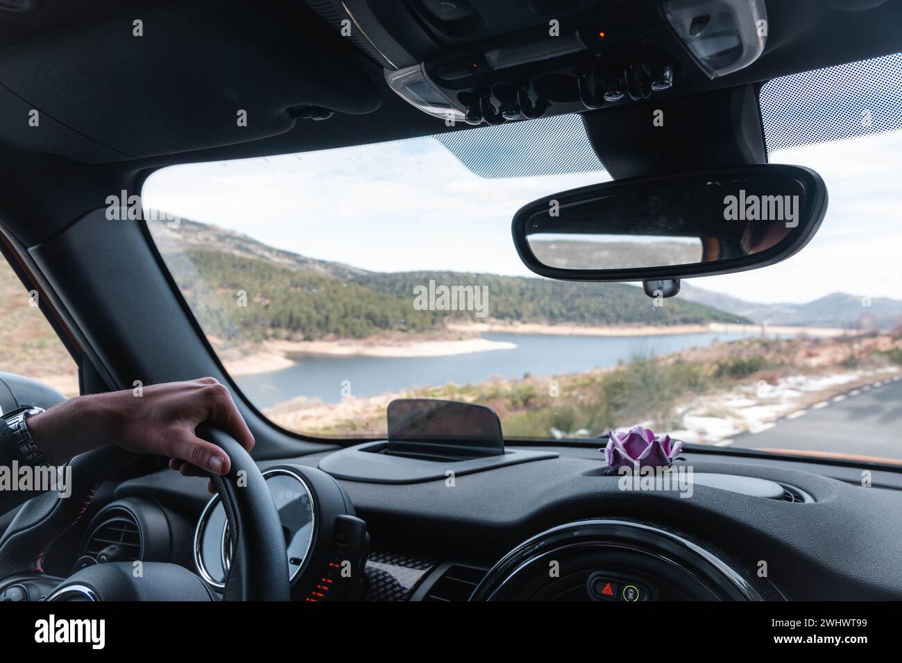Woman sitting behind steering wheel hi-res stock photography and images ...