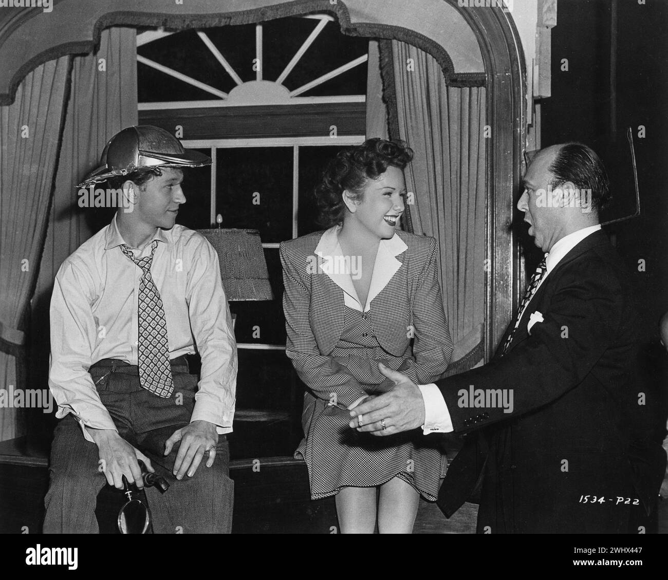 Candian film actress and singer DEANNA DURBIN photographed during the making of SOMETHING IN THE WIND 1947 with co-star DONALD O'CONNOR and music composer JOHNNY GREEN Director IRVING PICHEL Music JOHNNY GREEN Lyrics LEO ROBIN Universal Pictures Stock Photo
