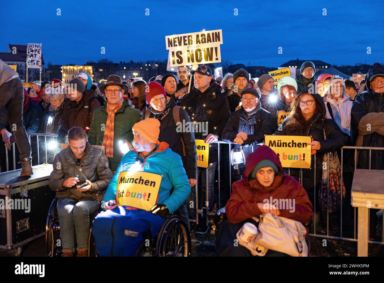 Munich, Germany. 11th Feb, 2024. Hundreds of thousands gathered on the Theresienwiese in Munich, Germany on February 11, 2024 for a so-called sea of lights against right-wing extremism, racism and the AfD. Participants illuminated the square in front of the Bavaria with flashlights, cell phone lights and lamps. The protest was motivated by a Correctiv research published this week on meetings in the Landhaus Adlon where deportation plans were elaborated. (Photo by Alexander Pohl/Sipa USA) Credit: Sipa USA/Alamy Live News Stock Photo