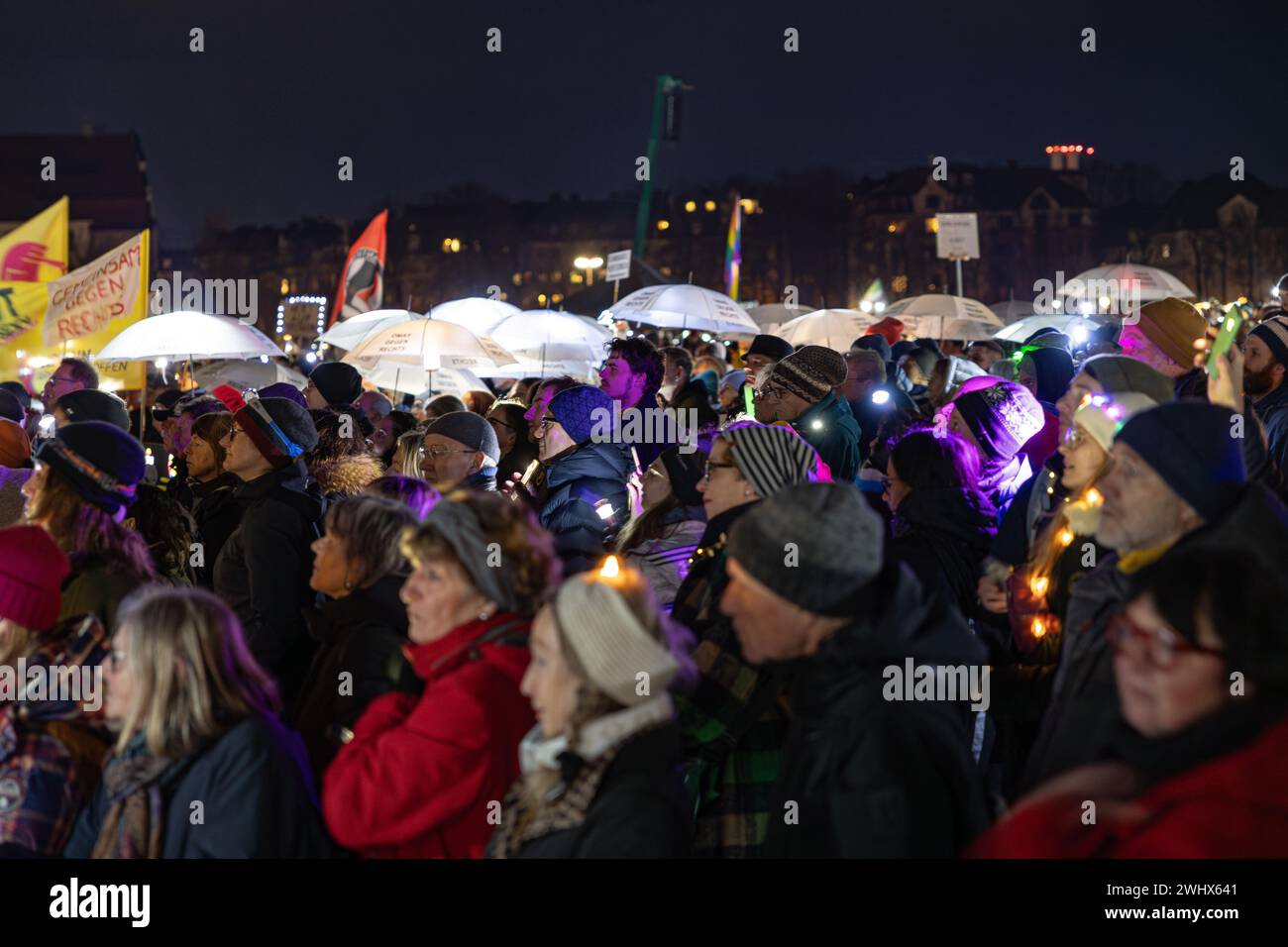 Munich, Germany. 11th Feb, 2024. Hundreds of thousands gathered on the Theresienwiese in Munich, Germany on February 11, 2024 for a so-called sea of lights against right-wing extremism, racism and the AfD. Participants illuminated the square in front of the Bavaria with flashlights, cell phone lights and lamps. The protest was motivated by a Correctiv research published this week on meetings in the Landhaus Adlon where deportation plans were elaborated. (Photo by Alexander Pohl/Sipa USA) Credit: Sipa USA/Alamy Live News Stock Photo