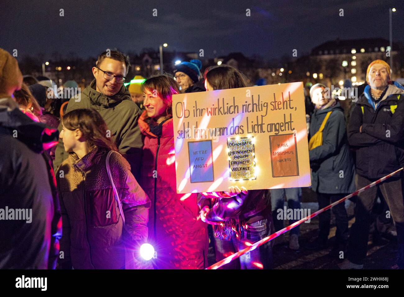 Munich, Germany. 11th Feb, 2024. Hundreds of thousands gathered on the Theresienwiese in Munich, Germany on February 11, 2024 for a so-called sea of lights against right-wing extremism, racism and the AfD. Participants illuminated the square in front of the Bavaria with flashlights, cell phone lights and lamps. The protest was motivated by a Correctiv research published this week on meetings in the Landhaus Adlon where deportation plans were elaborated. (Photo by Alexander Pohl/Sipa USA) Credit: Sipa USA/Alamy Live News Stock Photo